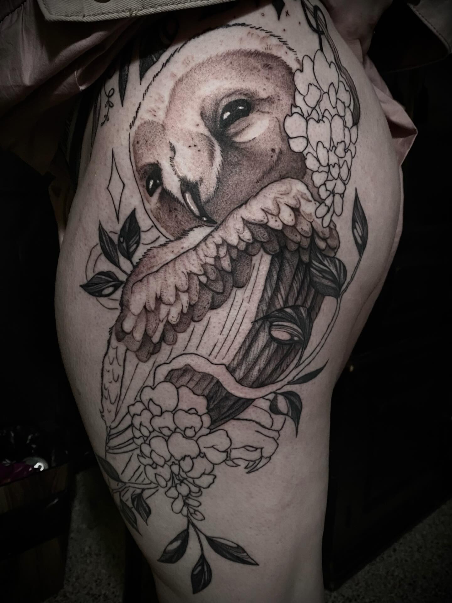 Owl and flowers realism tattoo on the thigh by Olivia Scott - Kansas Tattoo Artist