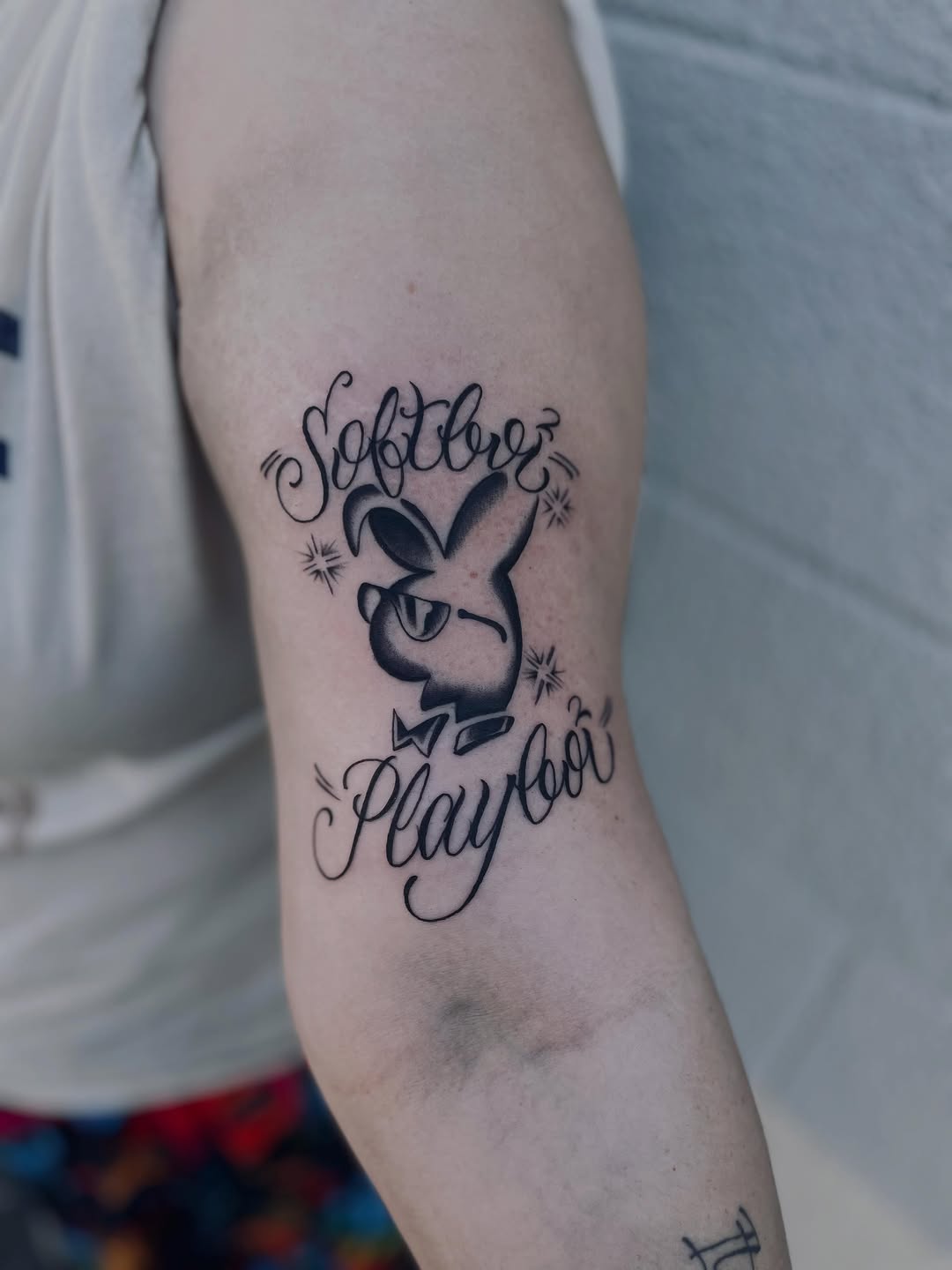 Playboy bunny with text cyber sigilism tattoo on the forearm by Christien Xavier Alba, Salt Lake City, Utah