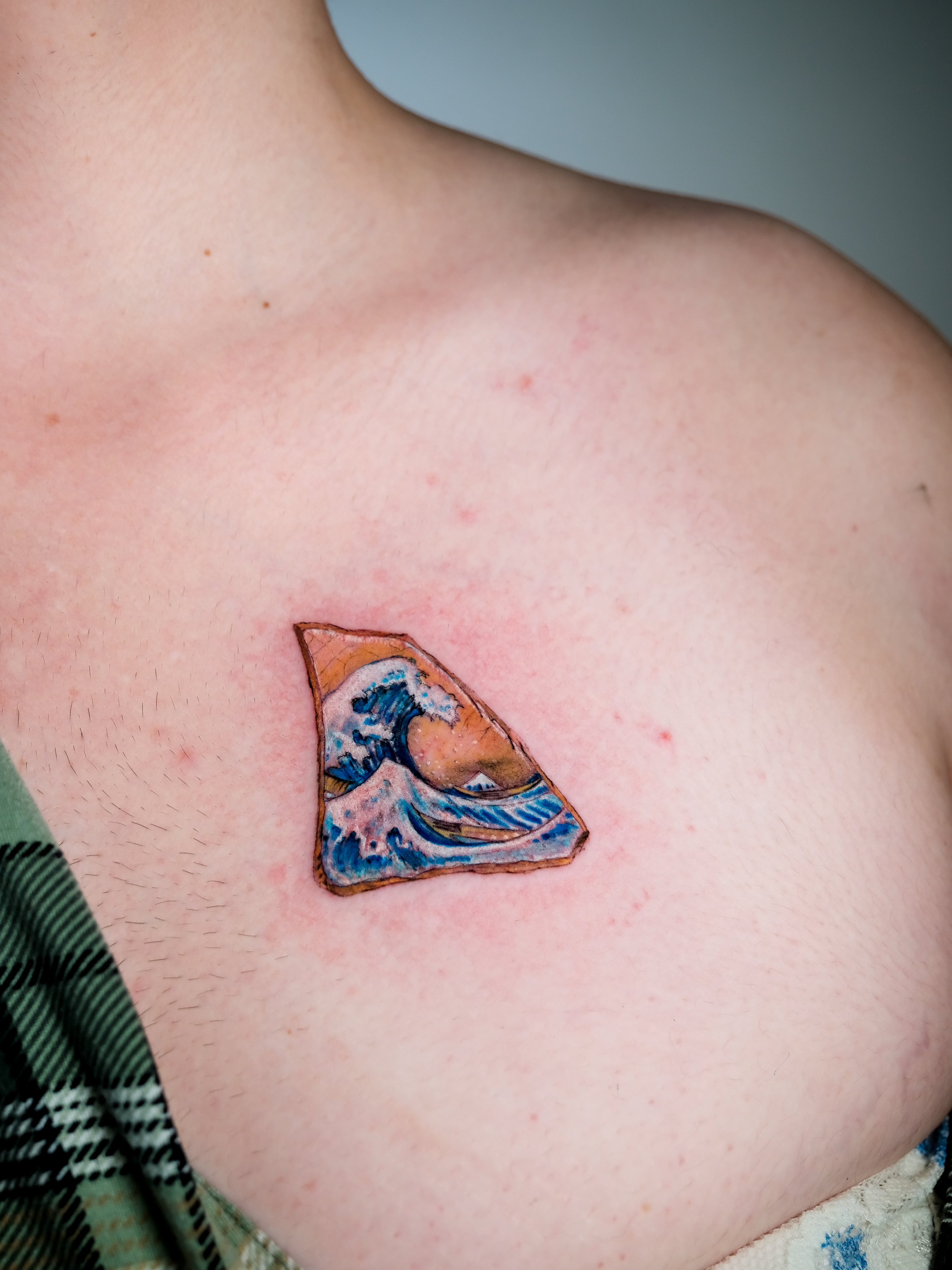 Wave realism tattoo on the chest by NAS