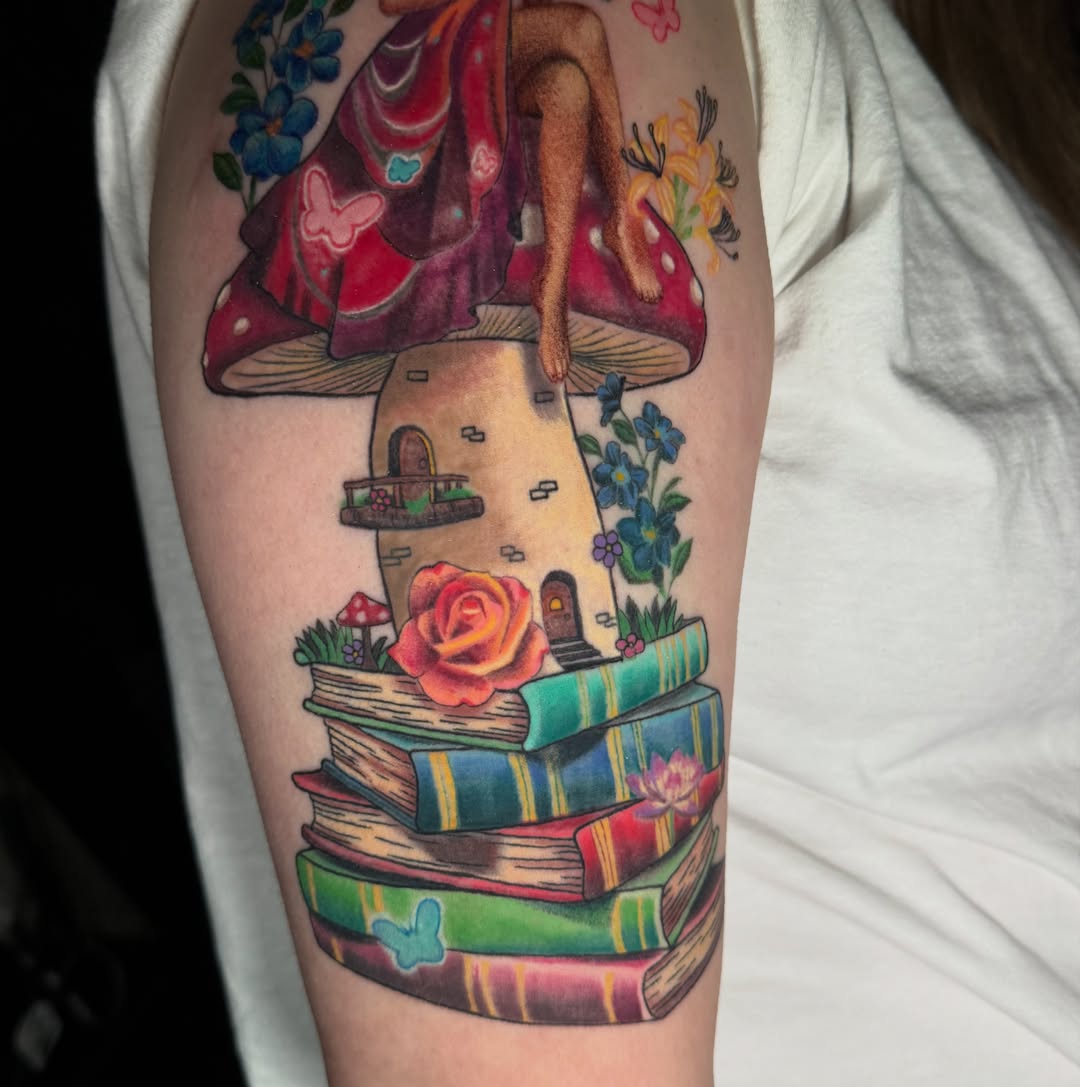 Book堆叠与蘑菇屋 illustrative tattoo on the forearm by Jennifer Kovach, Gastonia, North Carolina