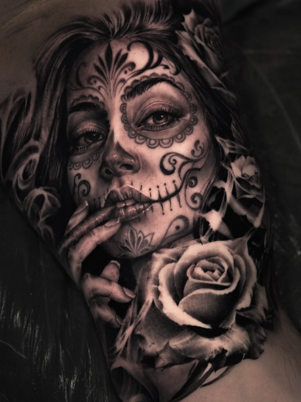 Sugar skull woman with roses realism tattoo by Pitasso tattoo black and grey
