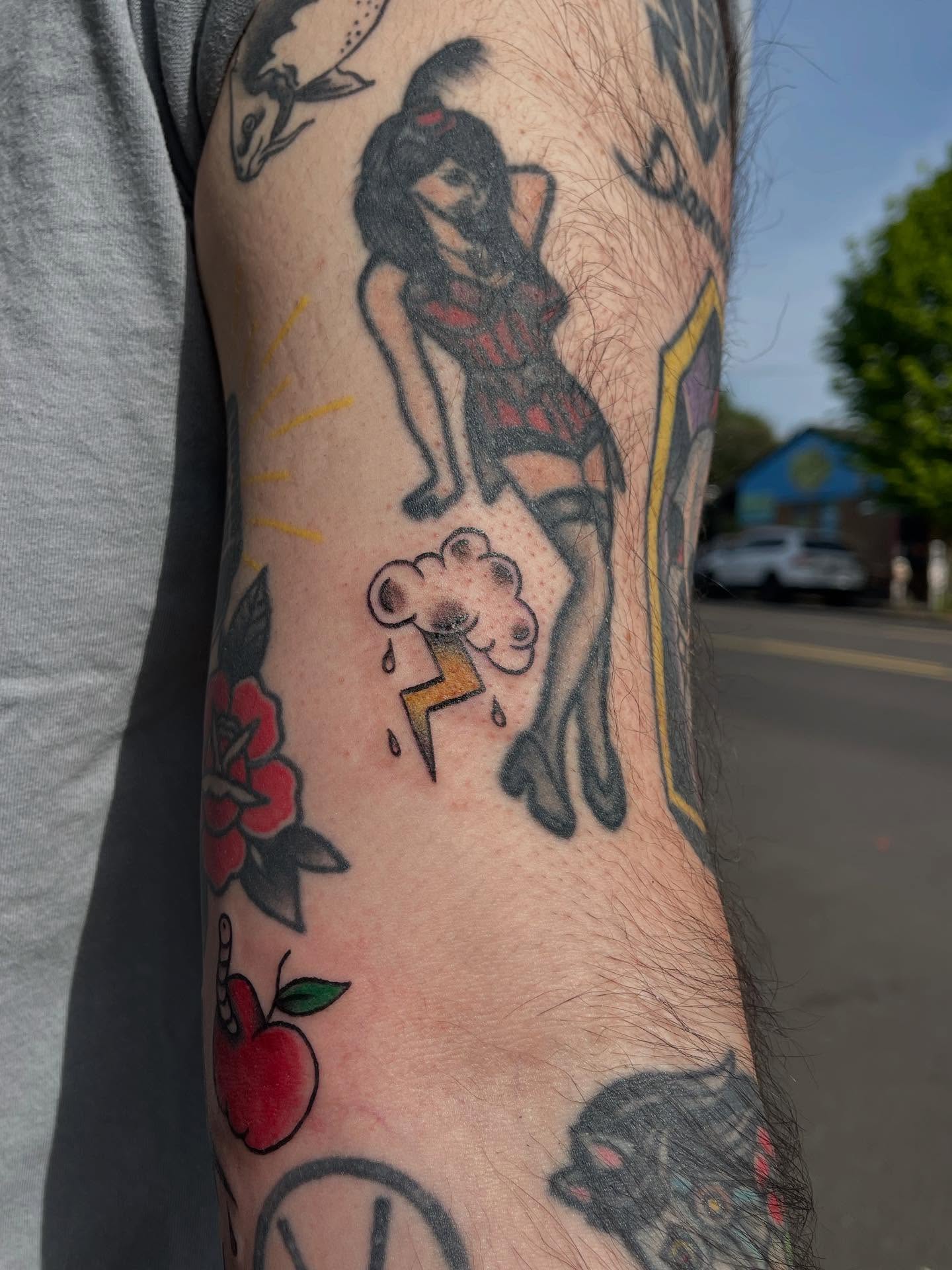 Female figure with cloud American traditional tattoo on the forearm by J❄️, Portland, Oregon