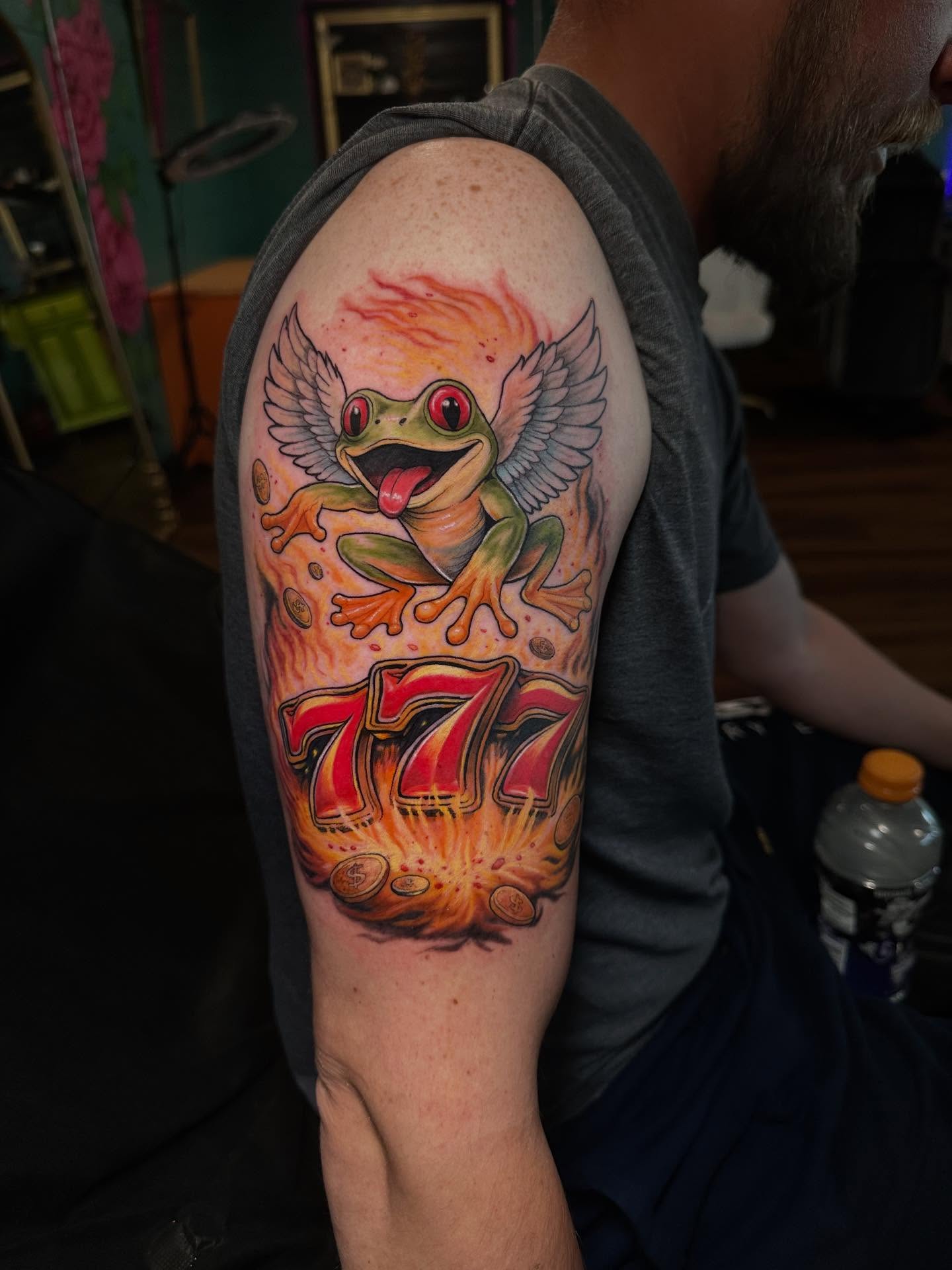 Frog with wings realism tattoo on the forearm by Mario Flores Tattoo