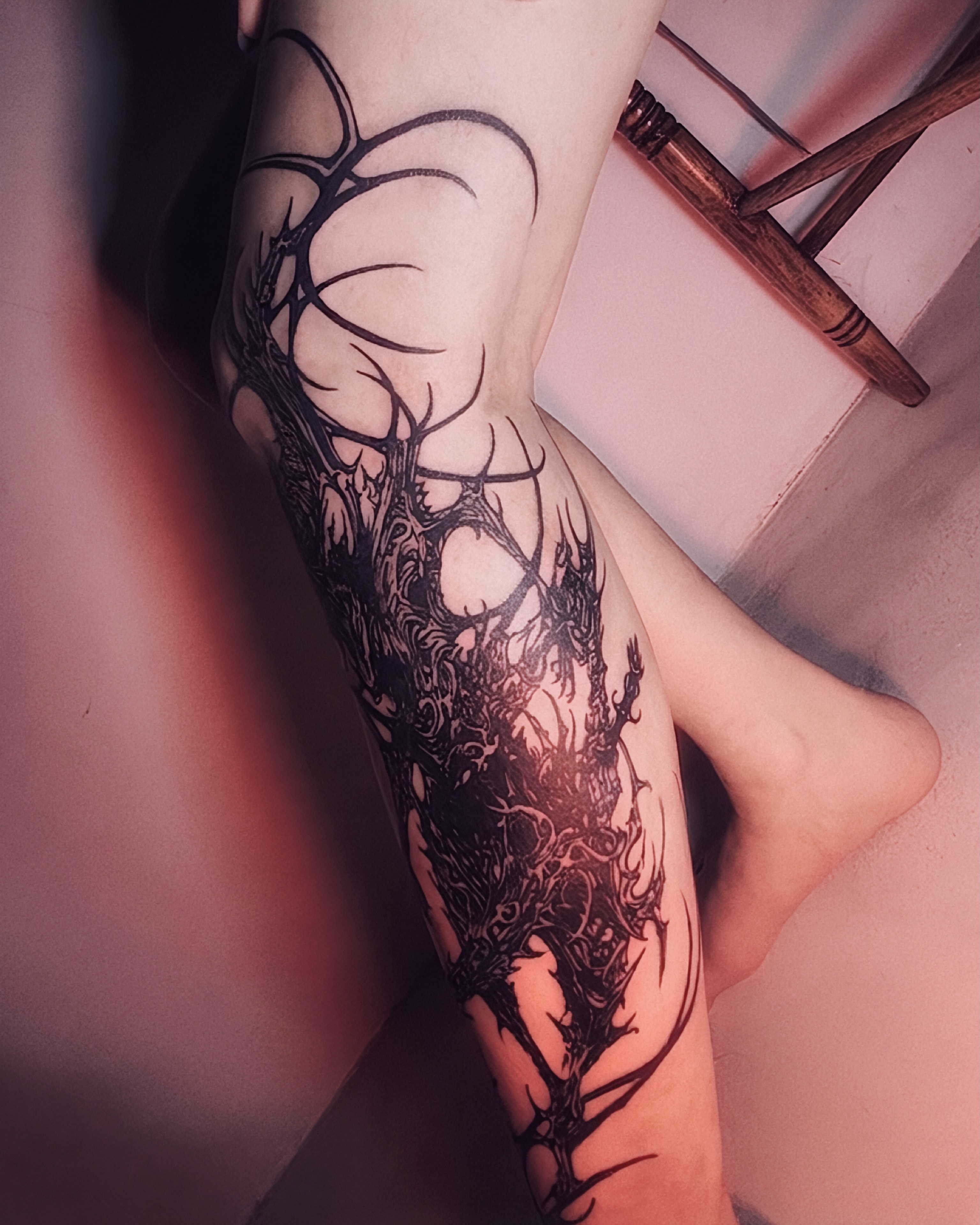Thorned tree blackwork tattoo on the calf by LX7