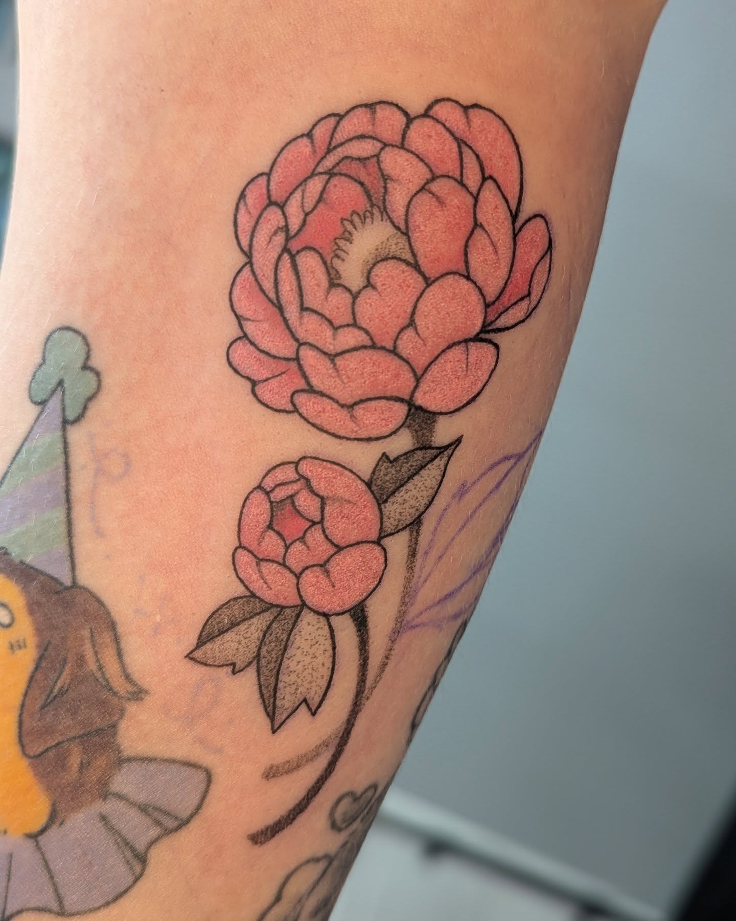 Peony flowers new school tattoo on the forearm by Spencer Jennings, Westland, Michigan
