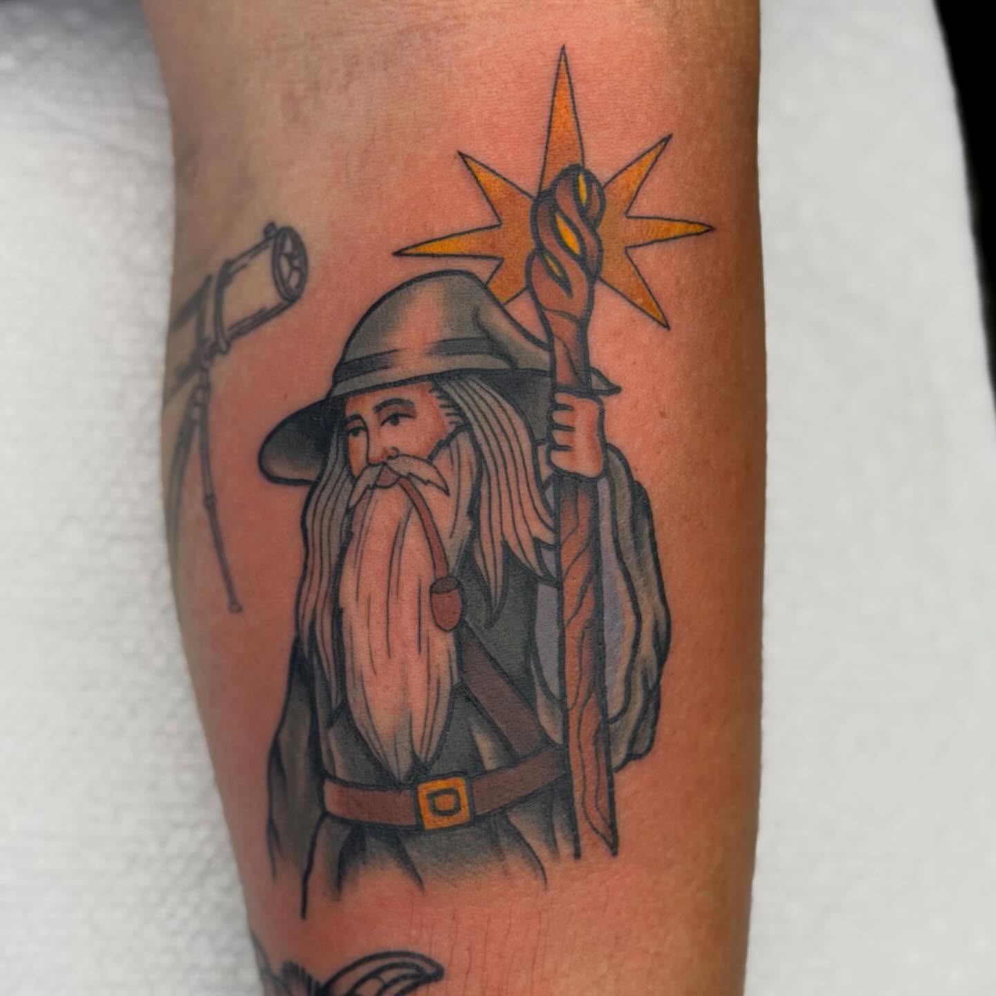 Wizard realism tattoo on the forearm by Jenna Szerszen-Wynn ๐