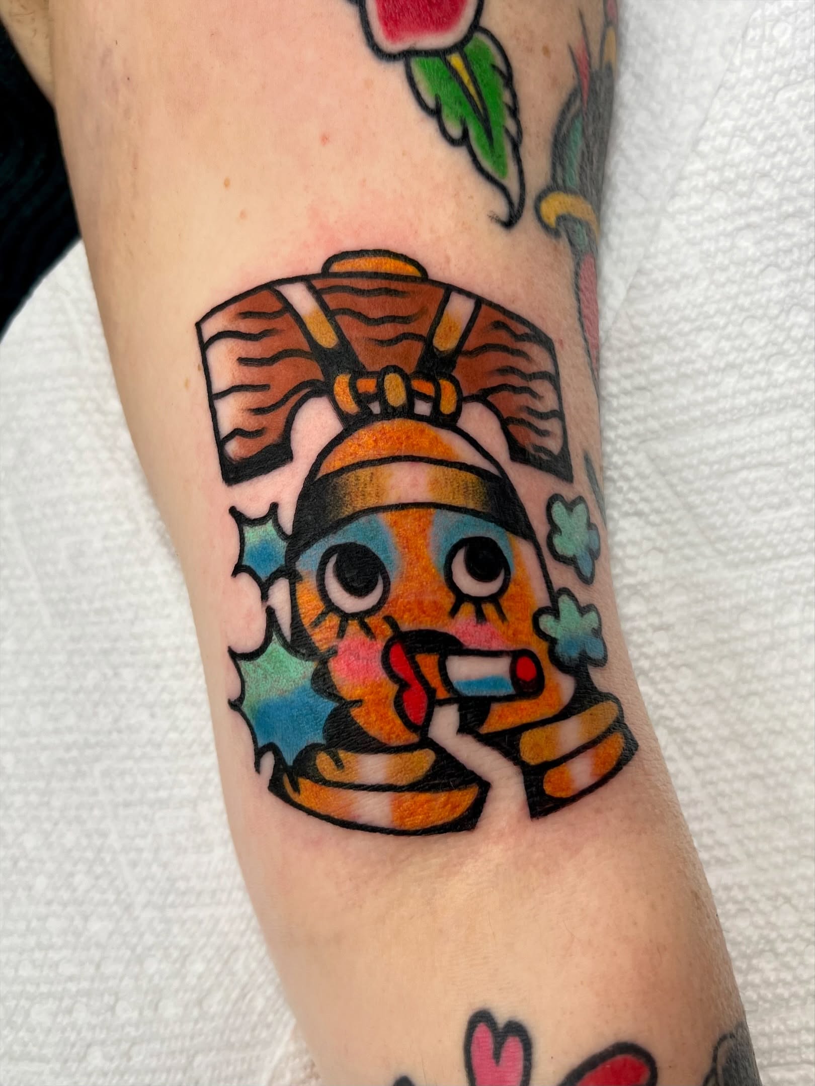 Robot American traditional tattoo on the forearm by Sierra Mack