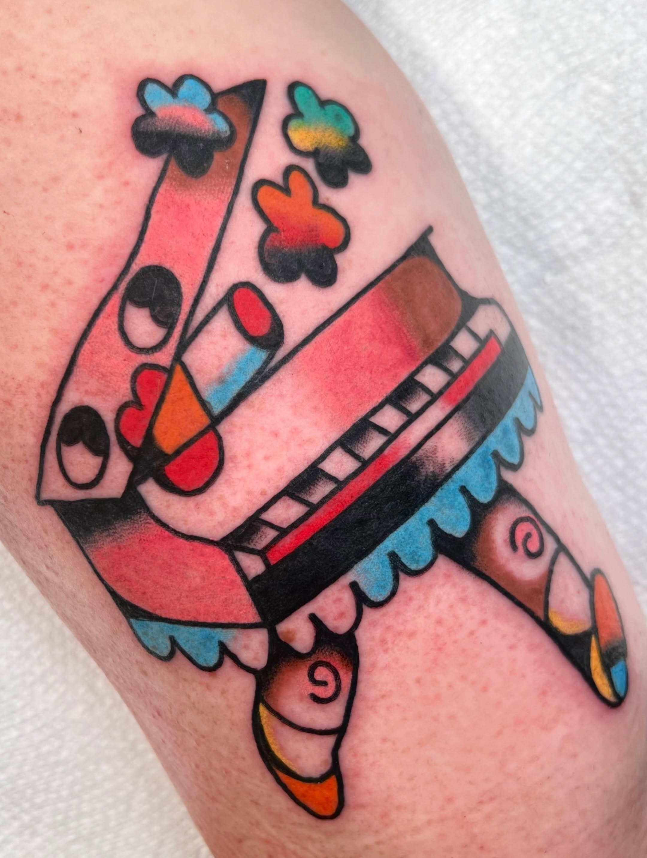 Airplane American traditional tattoo on the forearm by Sierra Mack