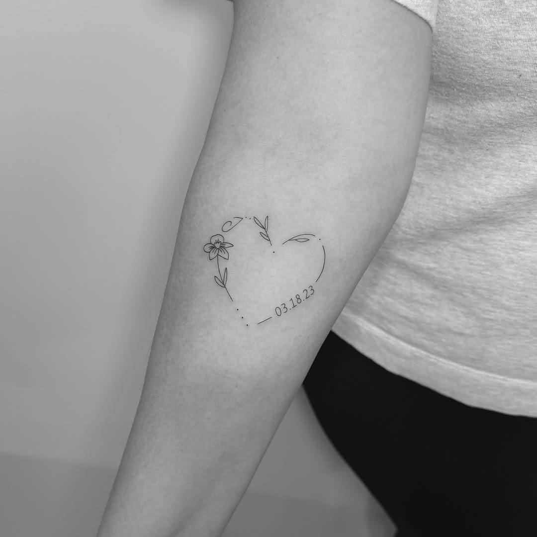 Heart with flowers fine line tattoo on the forearm by Jessica, Cheektowaga, New York