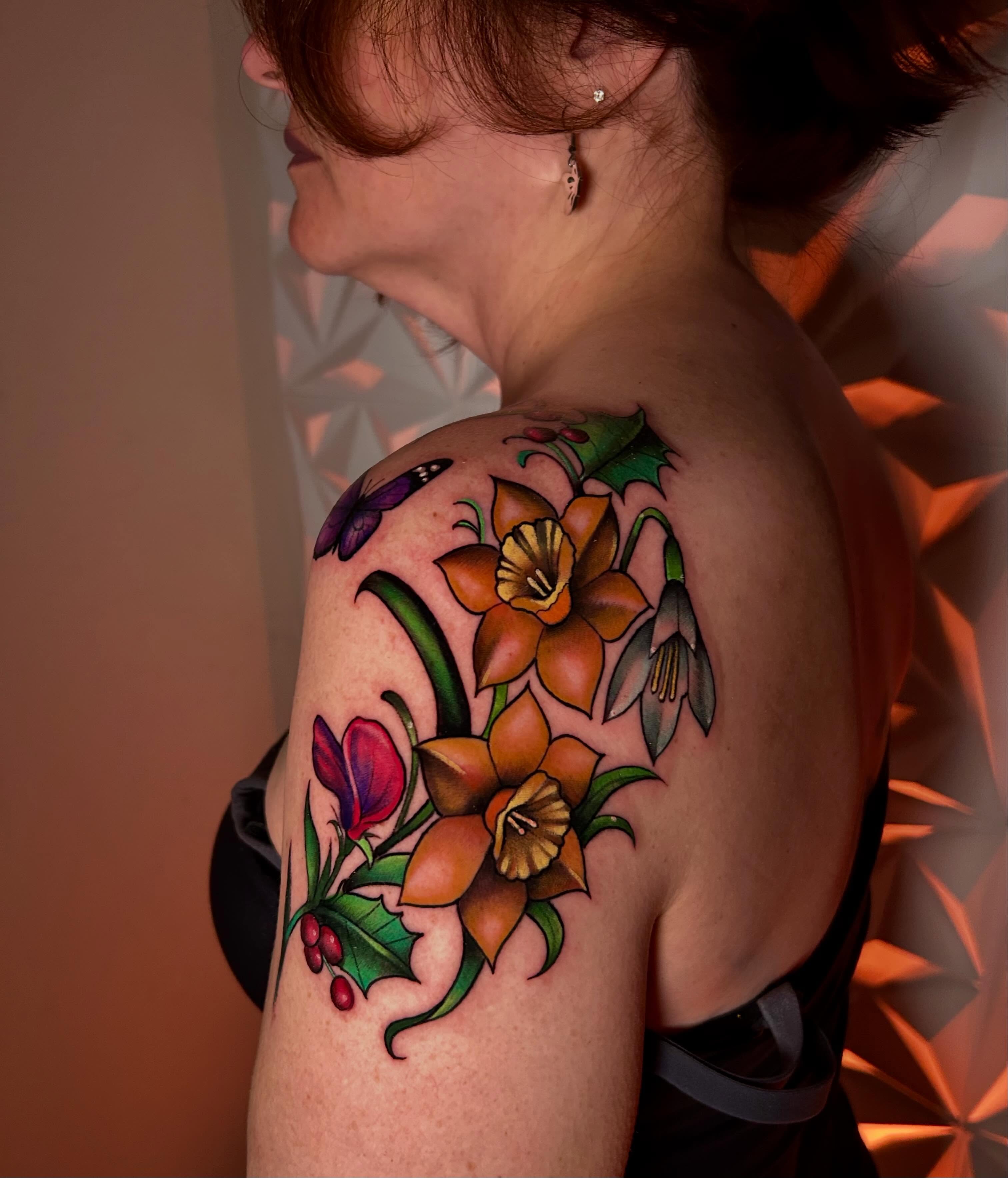 Daffodils and crocus new school tattoo on the shoulder by Haleigh Cunningham, Charlotte, North Carolina