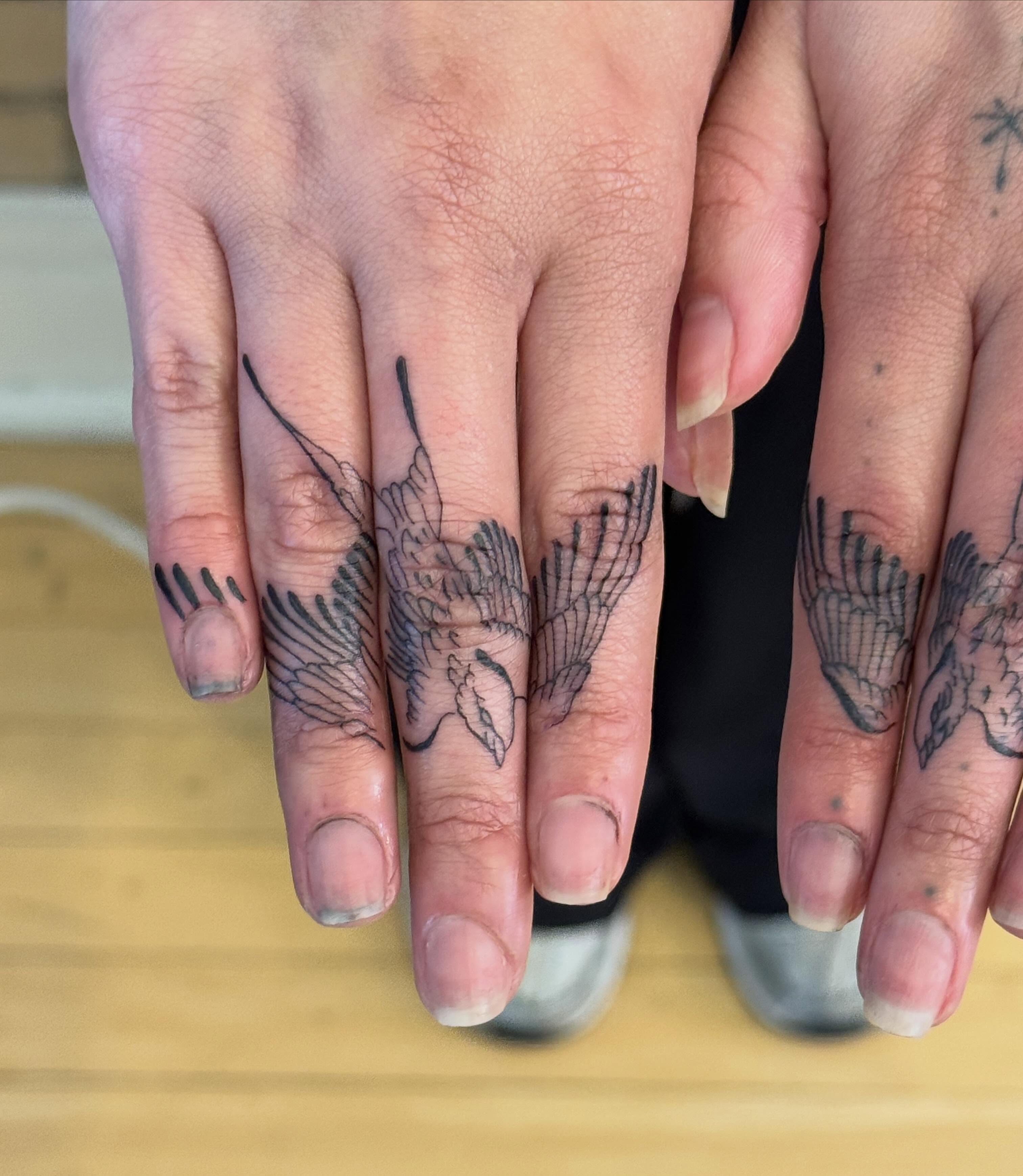 Birds black and grey tattoo on the hand by Dre