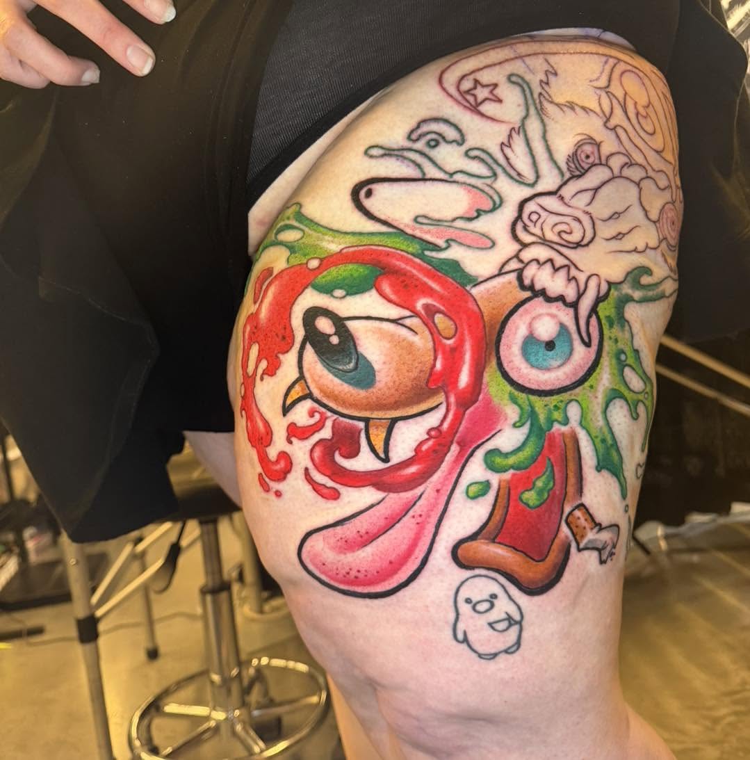 Melting eyes surrealism tattoo on the thigh by Tattoos by Aeron Herald Maurbjorn, Sioux