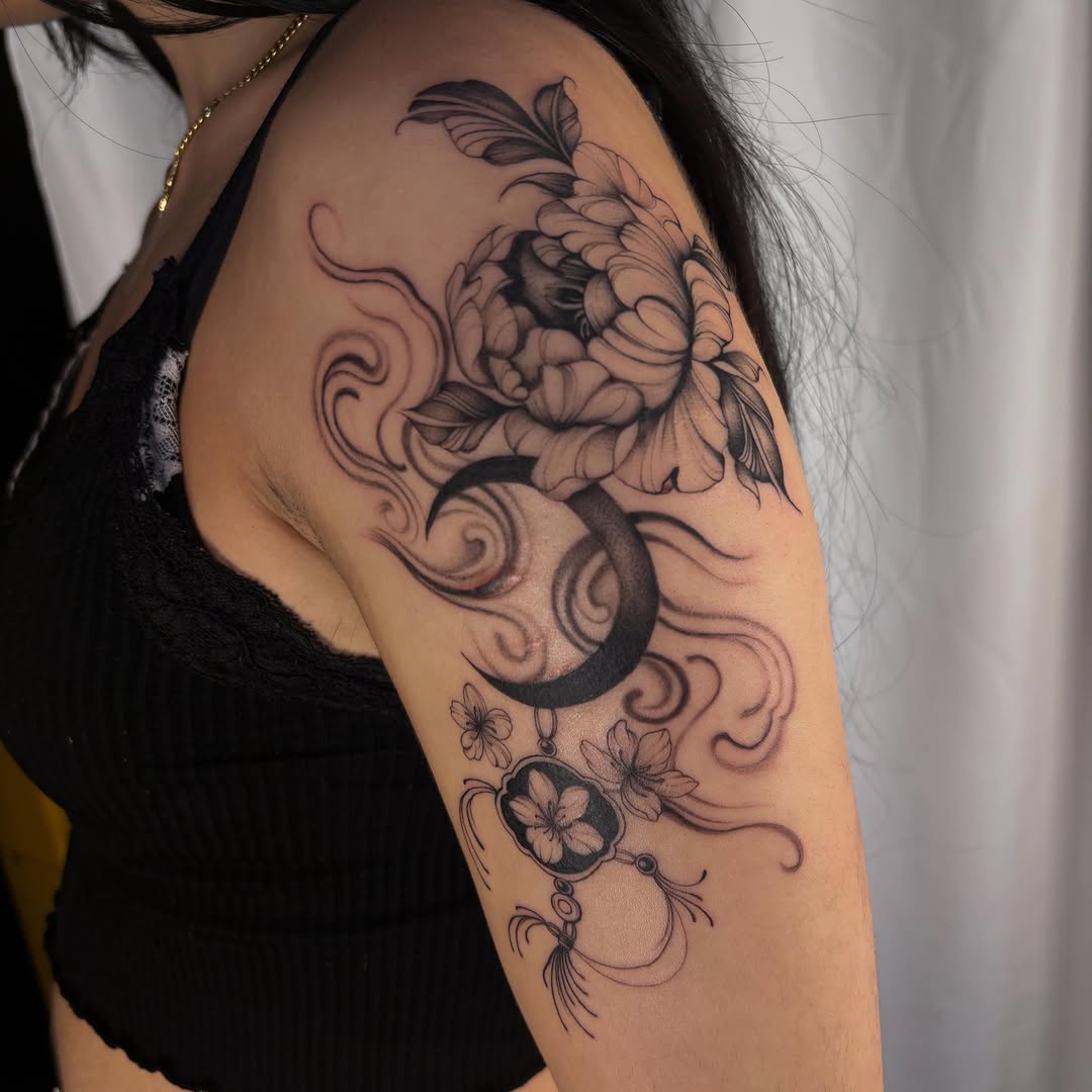 Peony, moon, and floral pendant fine line tattoo on the shoulder by ꩜ 𖦹