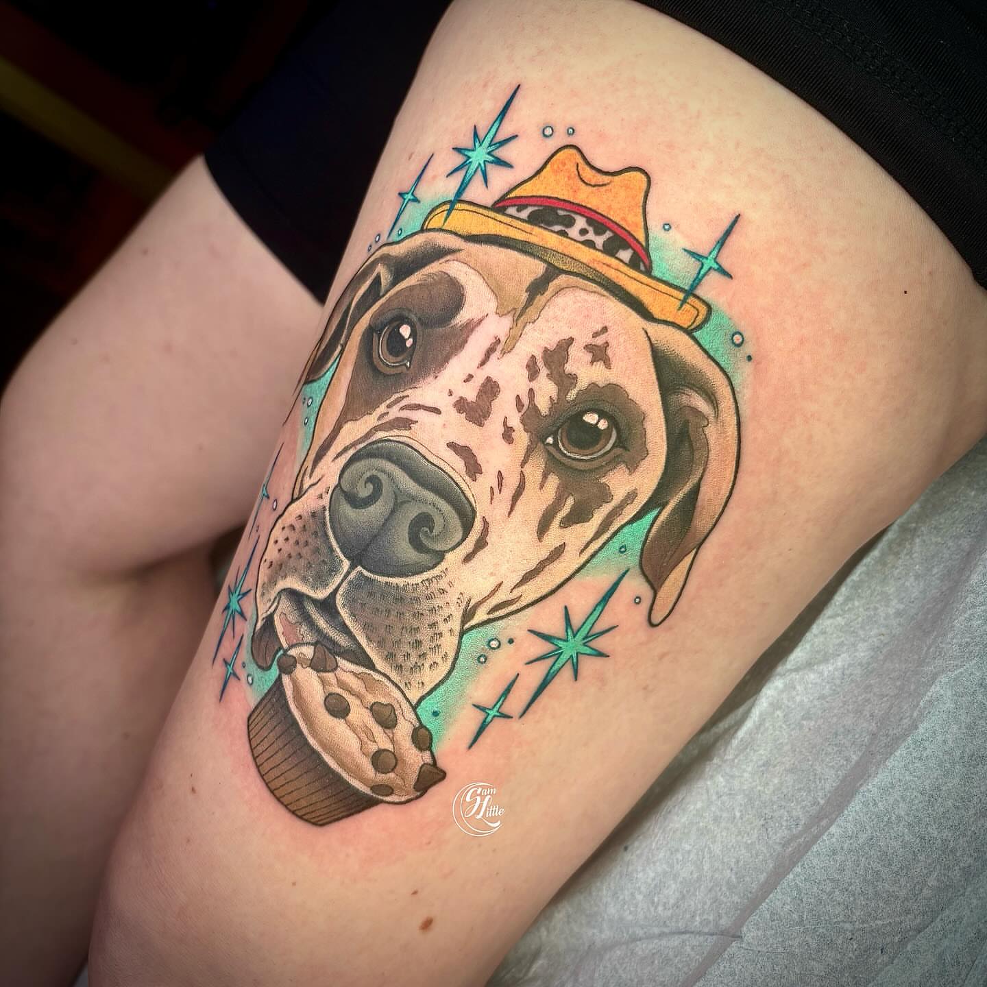 Dog with hat American traditional tattoo on the thigh by 𝓢𝓪𝓶 𝓛𝓲𝓽𝓽𝓵𝓮