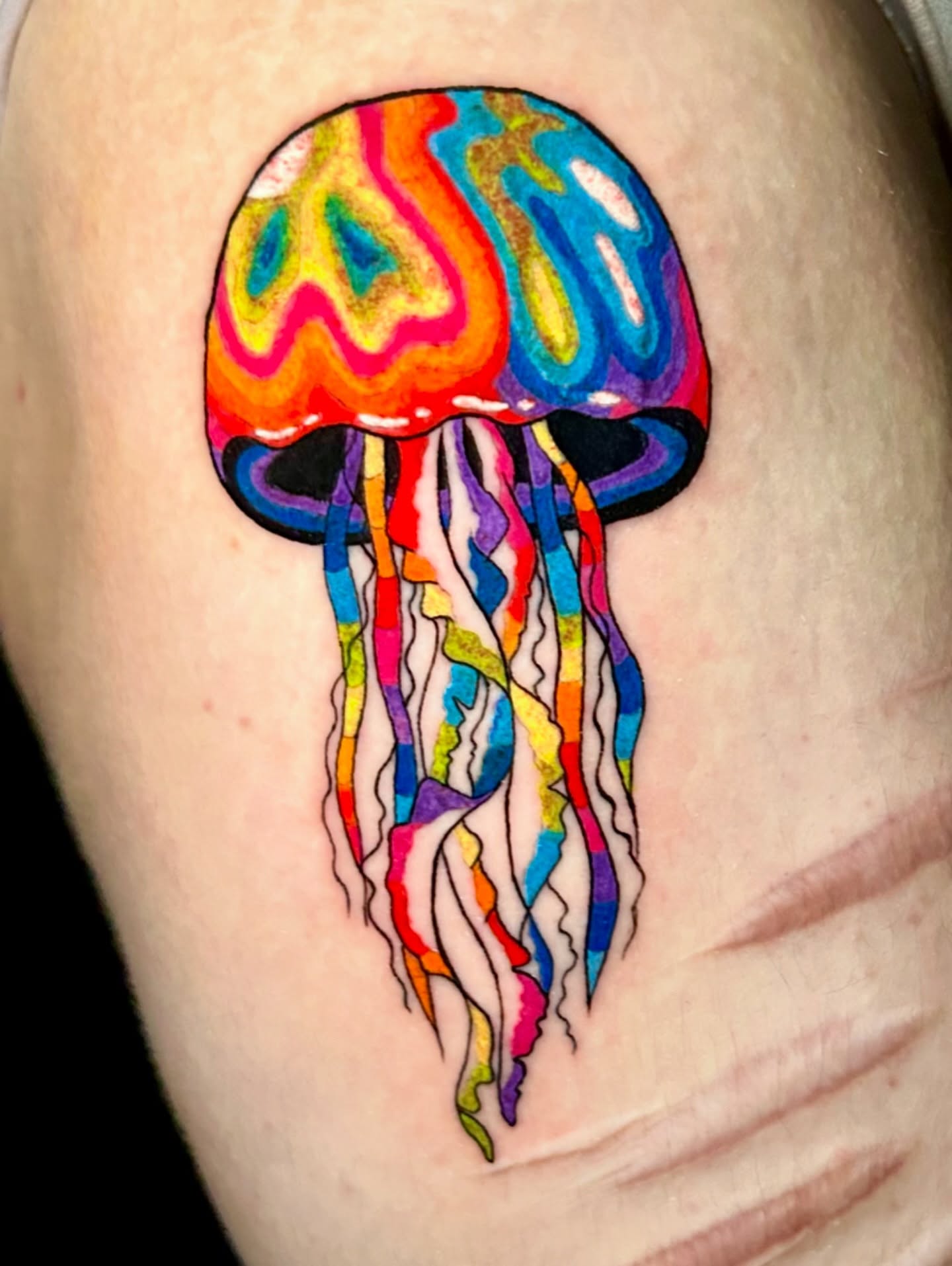 Jellyfish new school tattoo on the thigh by Tess