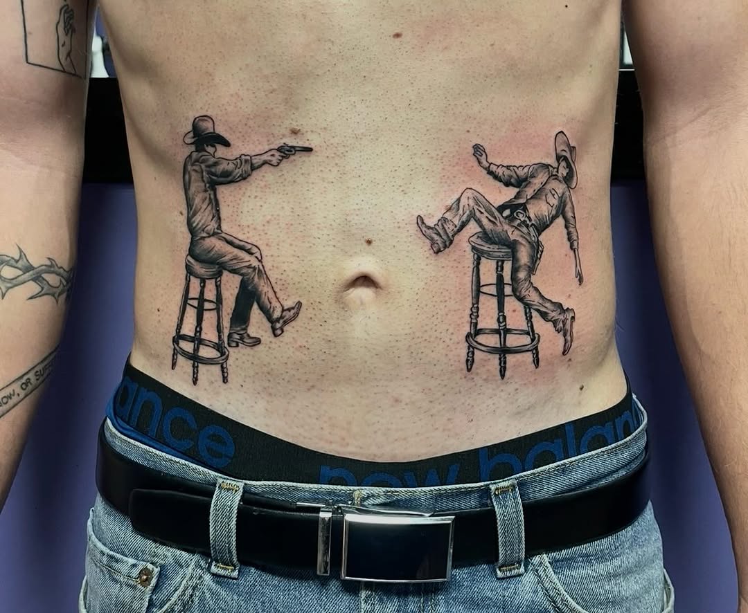 Cowboys on bar stools ignorant tattoo on the torso by Mark Calloway