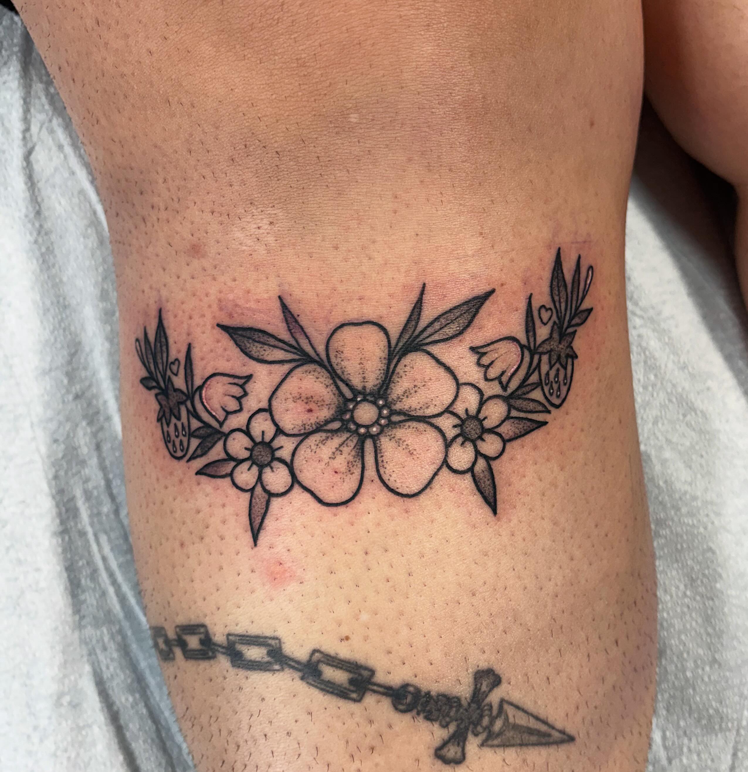 Flower wreath black and grey tattoo on the thigh by Demi Flores 🖤