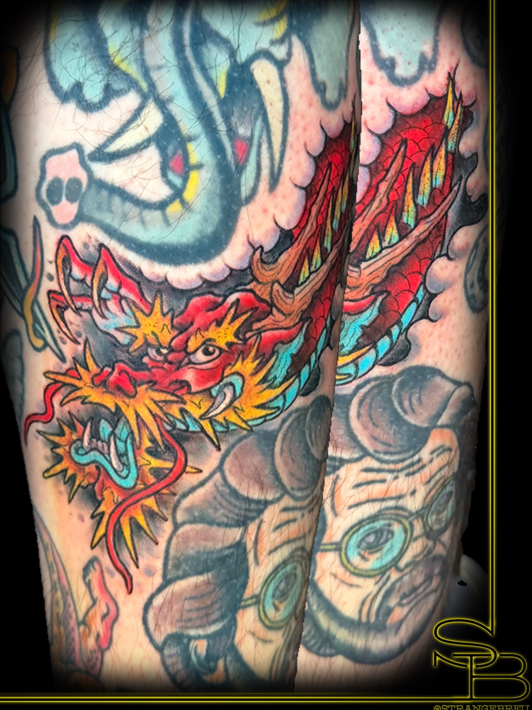 Dragon American traditional tattoo on the forearm by Chris Breuer, Asbury Park, New Jersey