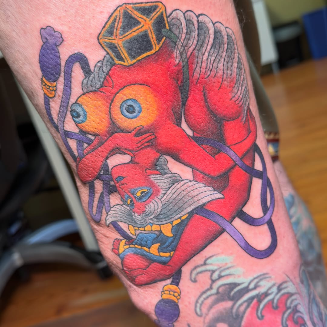Demon with multiple eyes geometric tattoo on the forearm by James Bird, Vancouver, British Columbia