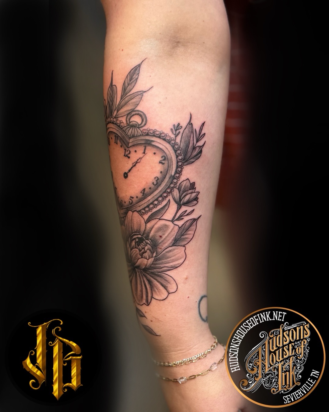 Heart clock realism tattoo on the forearm by James Brooks