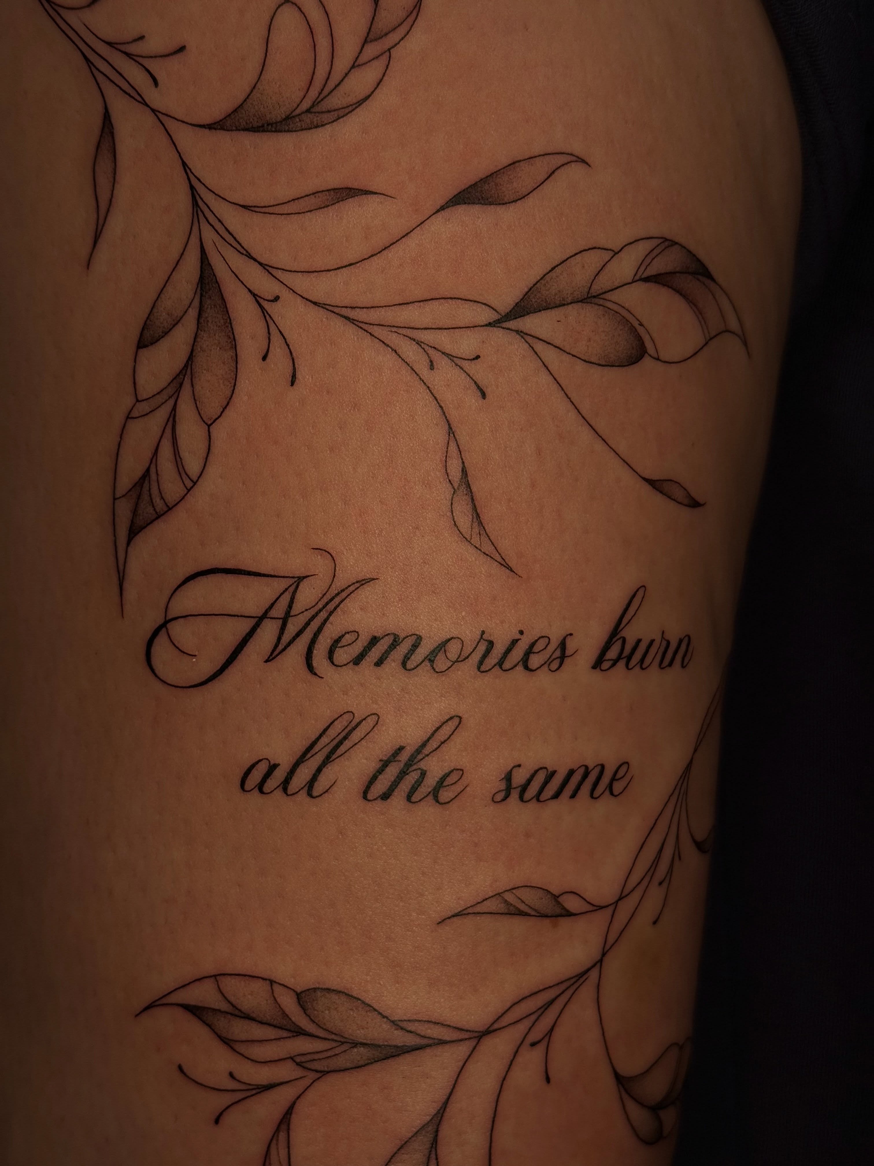 Script lettering with floral elements tattoo on the forearm by 𝔍𝔲𝔩𝔦𝔞, New York, New York