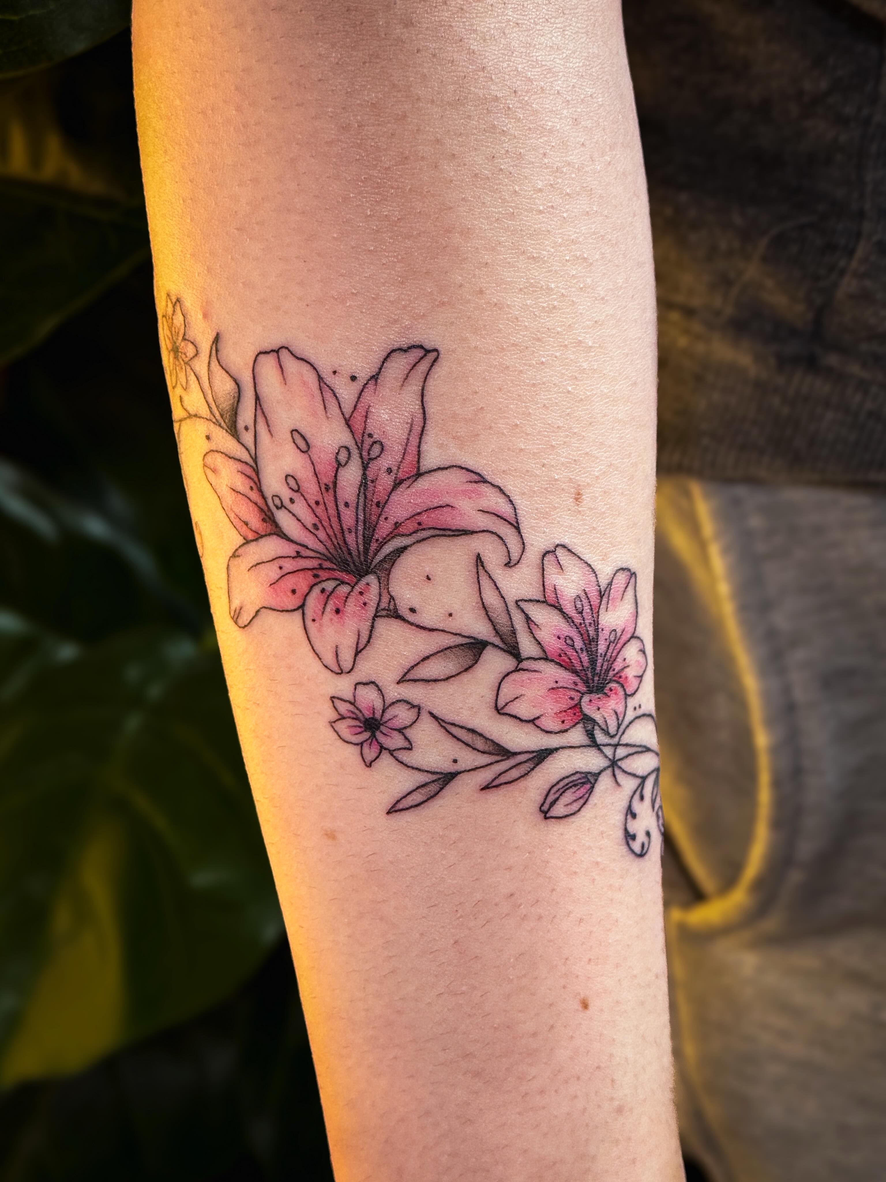 Lilies dotwork tattoo on the forearm by Ash✨