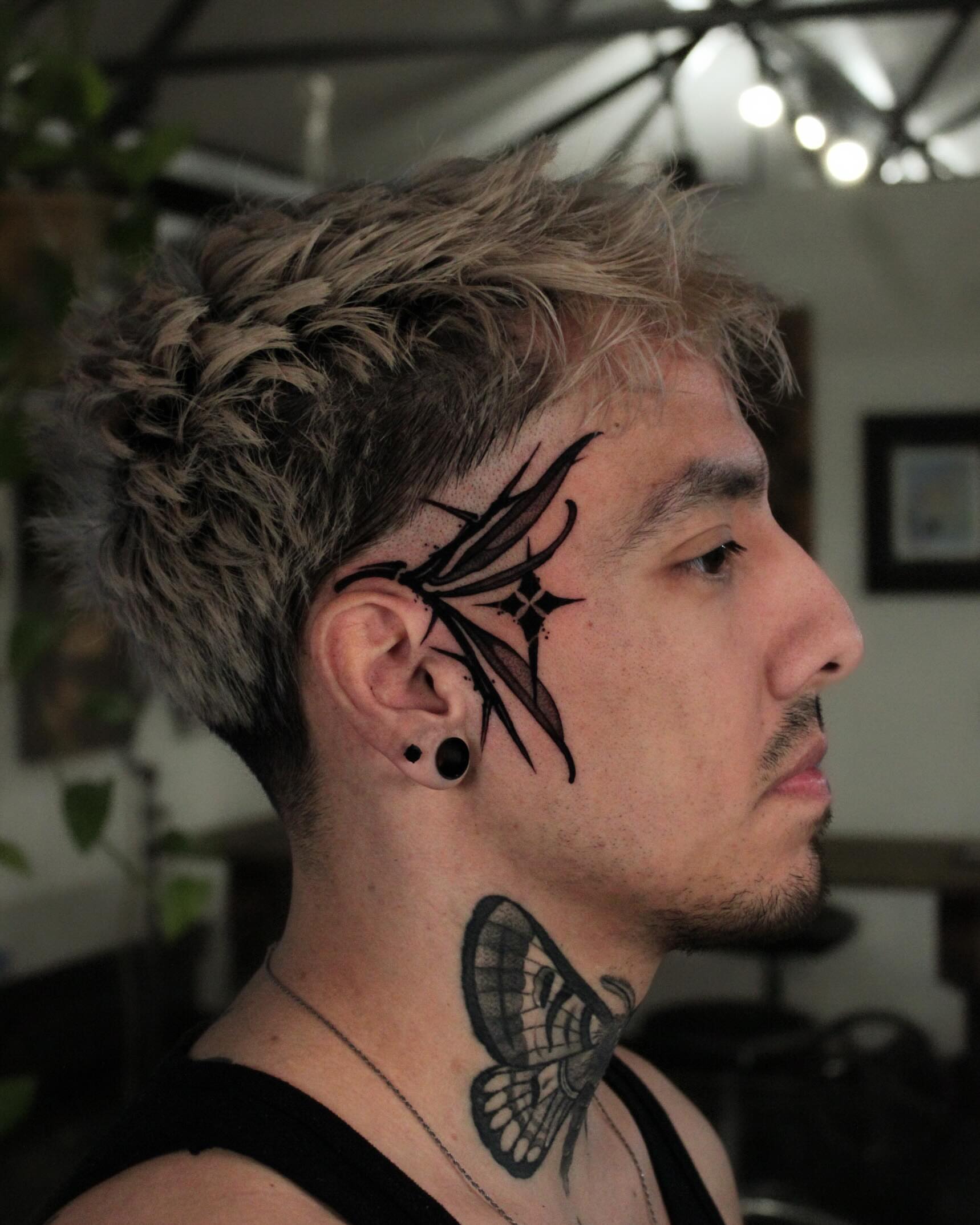 Butterfly black and grey tattoo on the neck by Heather Apgar