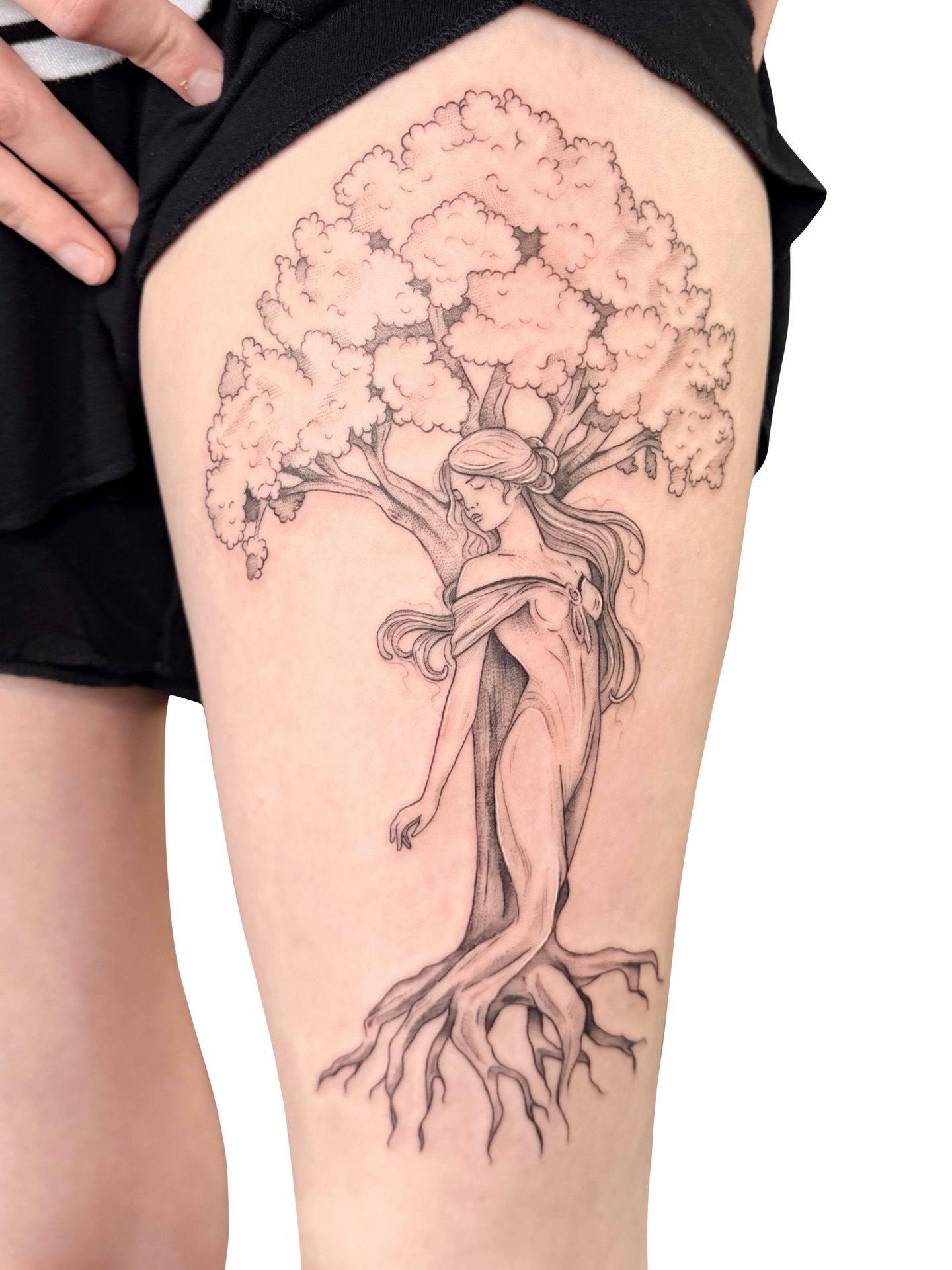 Tree woman realism tattoo on the thigh by Fionna, Seattle, Washington