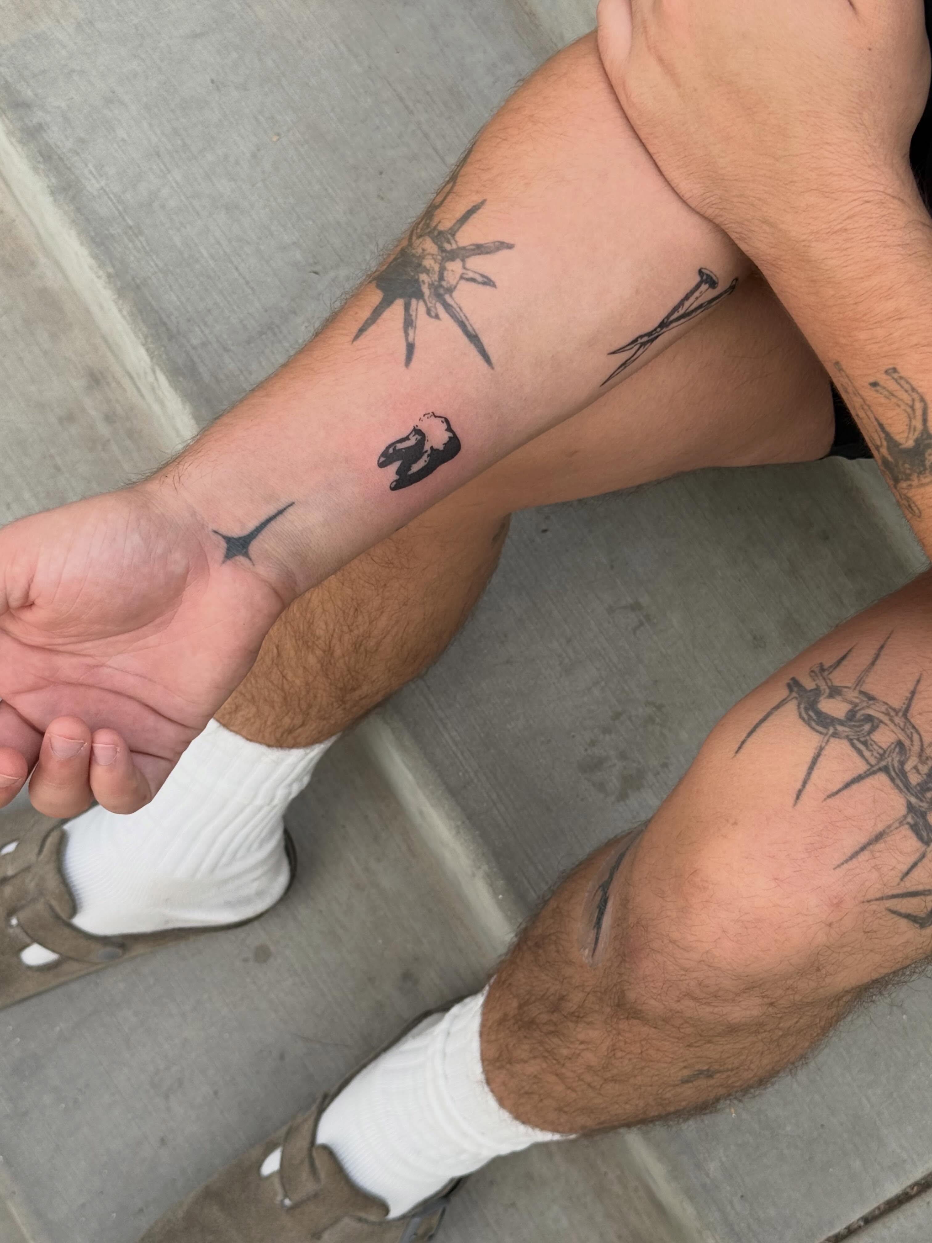 Religious symbols black and grey tattoo on the forearm by TATTOO & PIERCING ARTIST ₊˚⊹ ᰔ