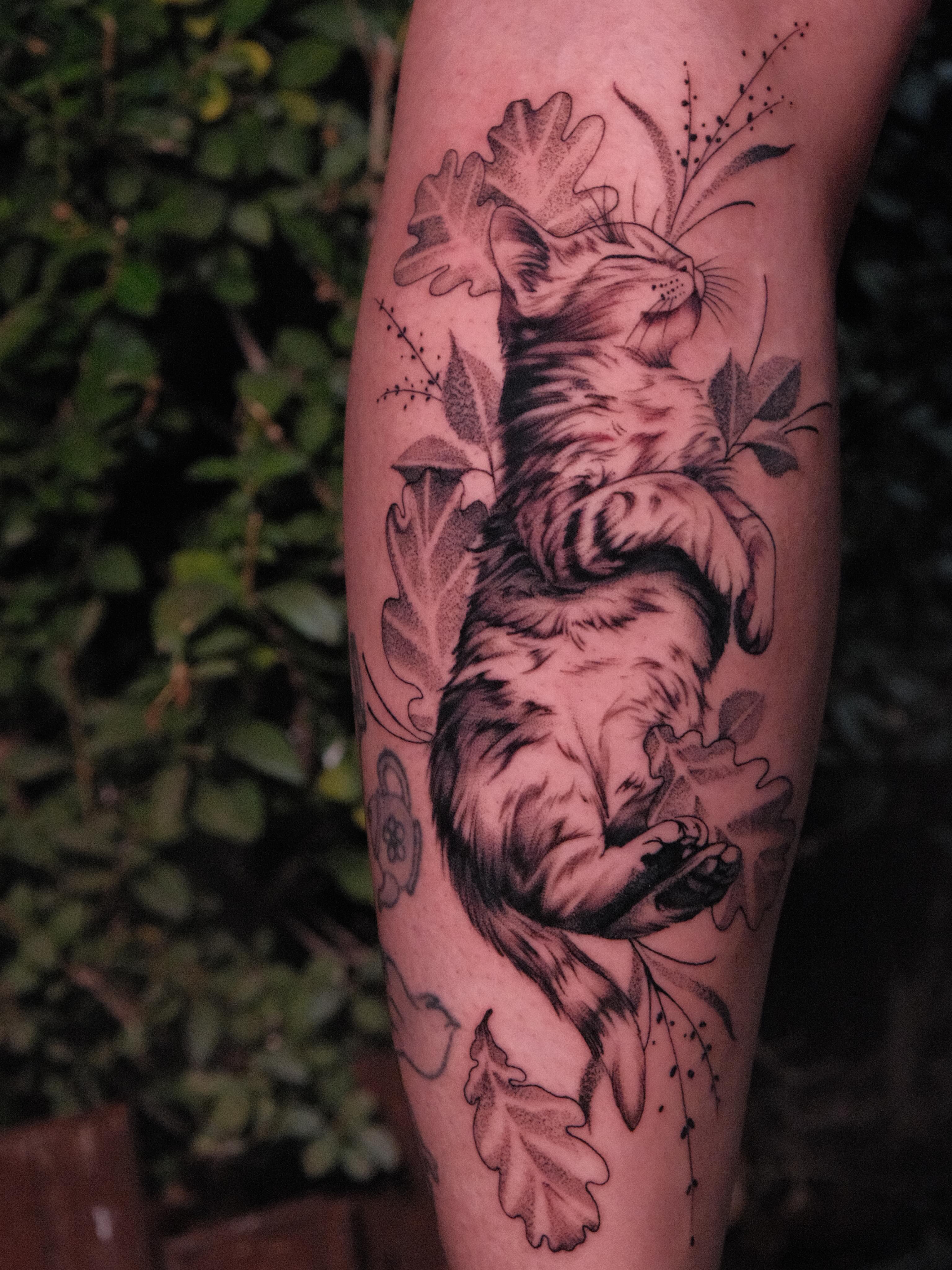 Cat realism tattoo on the forearm by JoeyJazz
