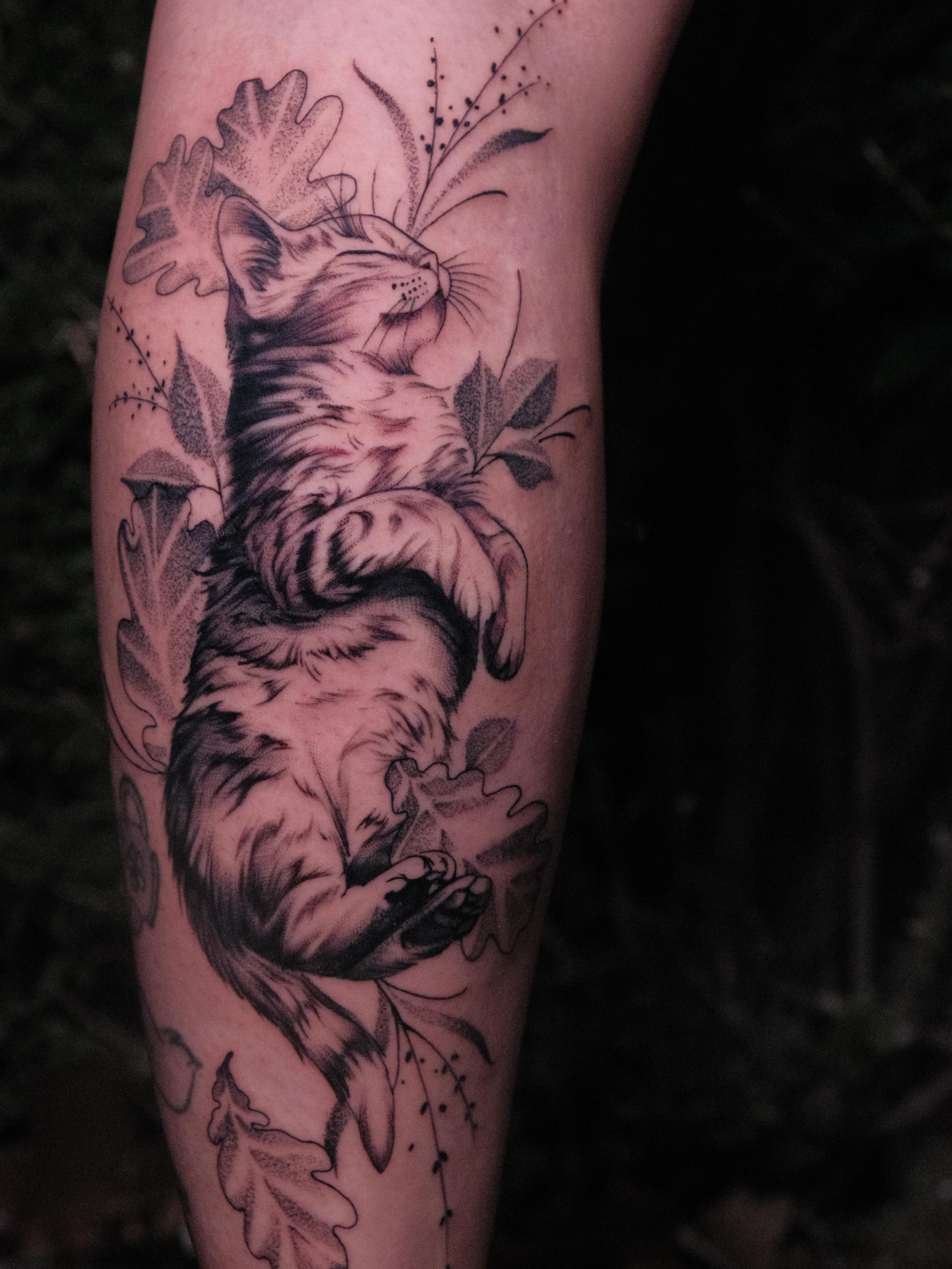 Cat realism tattoo on the forearm by JoeyJazz