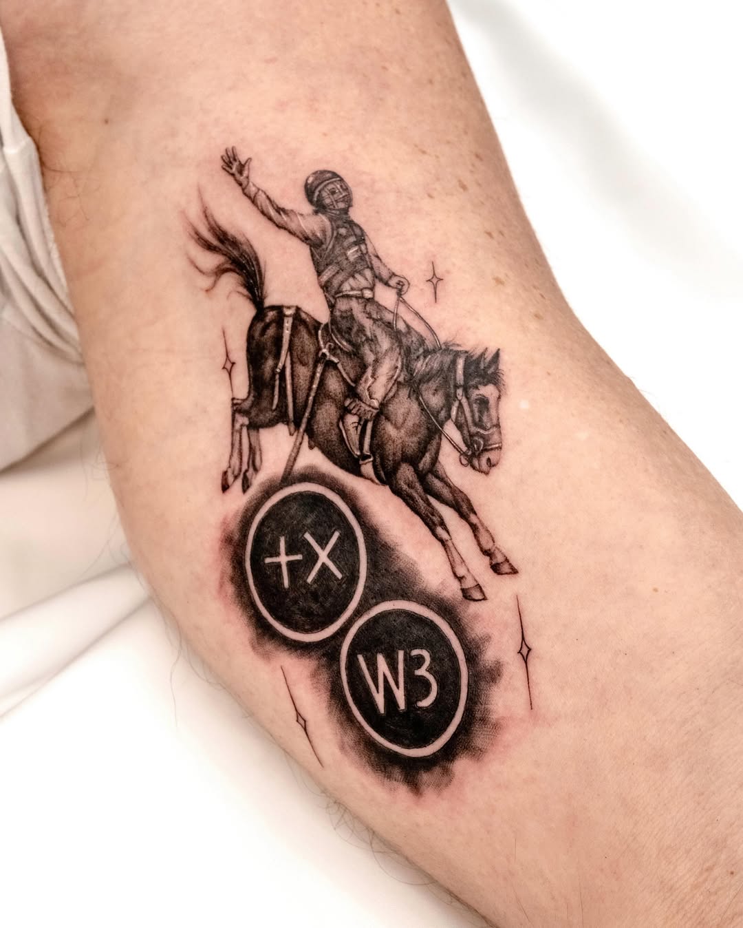 Rider on horse black and grey tattoo on the forearm by Koko