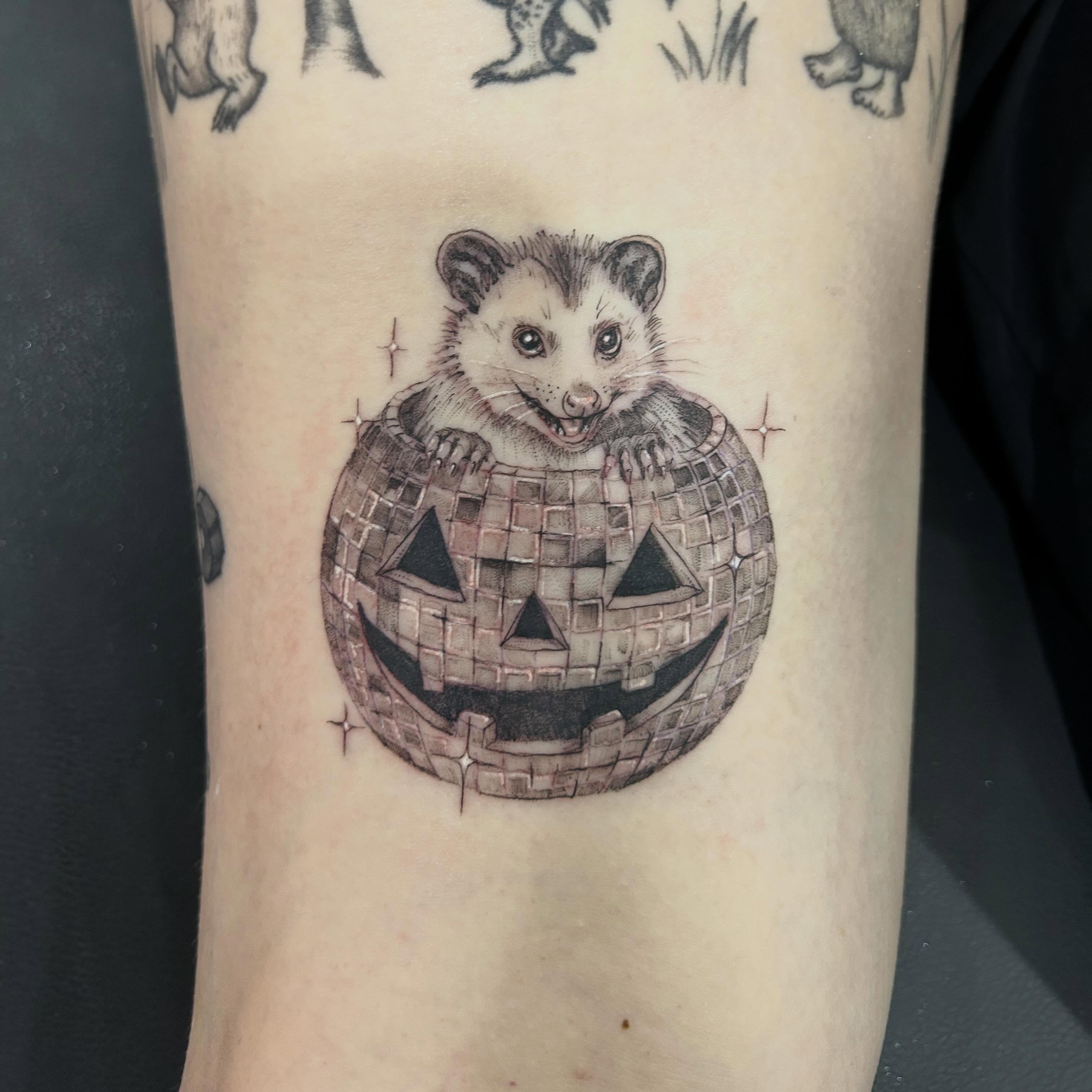 Possum in pumpkin realism tattoo on the forearm by Elizabeth (Lib), Murfreesboro, Tennessee