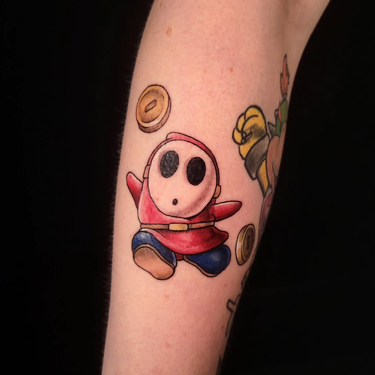 Kirby dotwork tattoo on the forearm by Sarah Alba