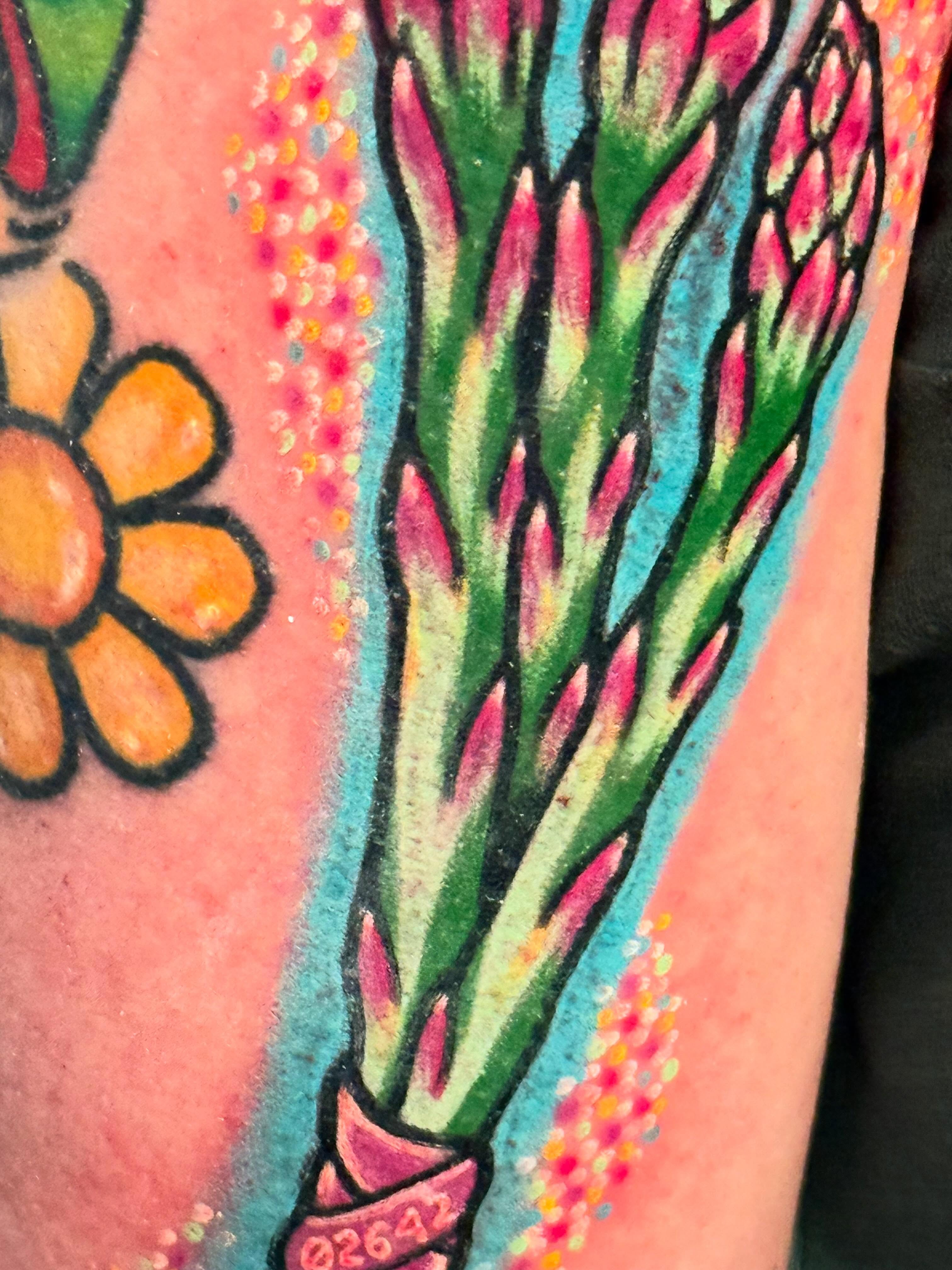 Flower bouquet American traditional tattoo on the forearm by Mackz