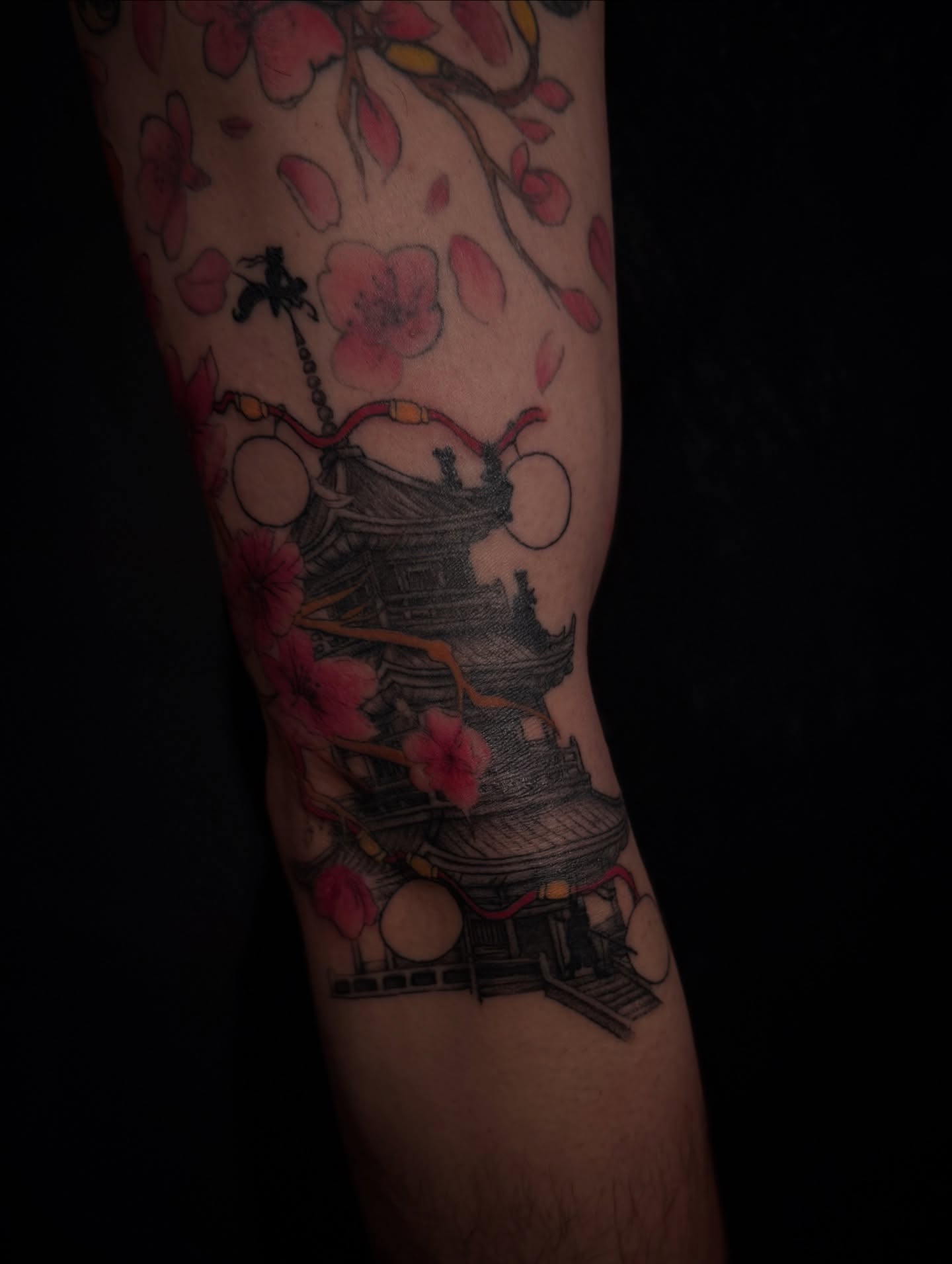Cherry blossoms and pagoda japanese irezumi tattoo on the forearm by Gianna G