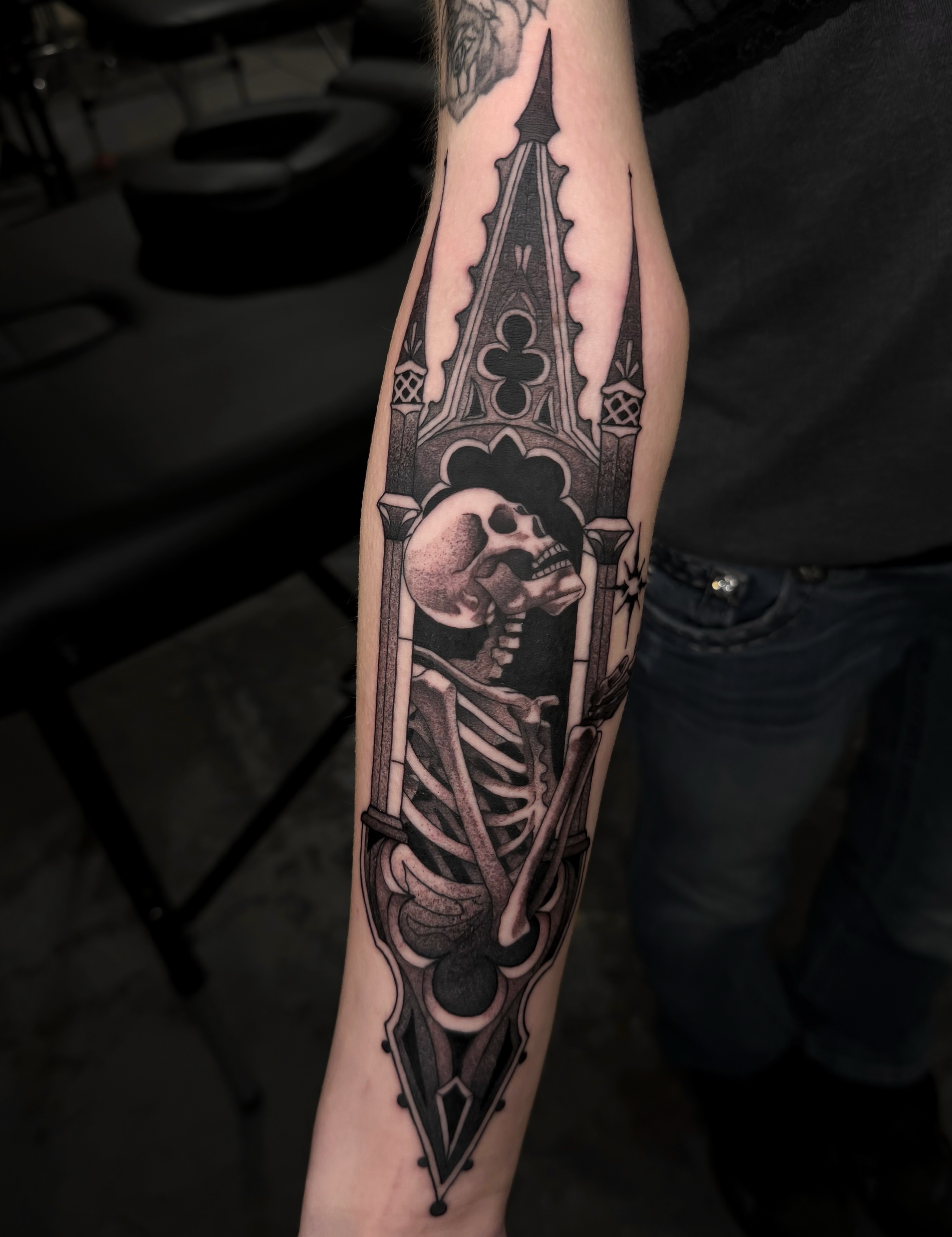 Skeleton in gothic arch geometric tattoo on the forearm by Hades cabrera, Richmond, Virginia