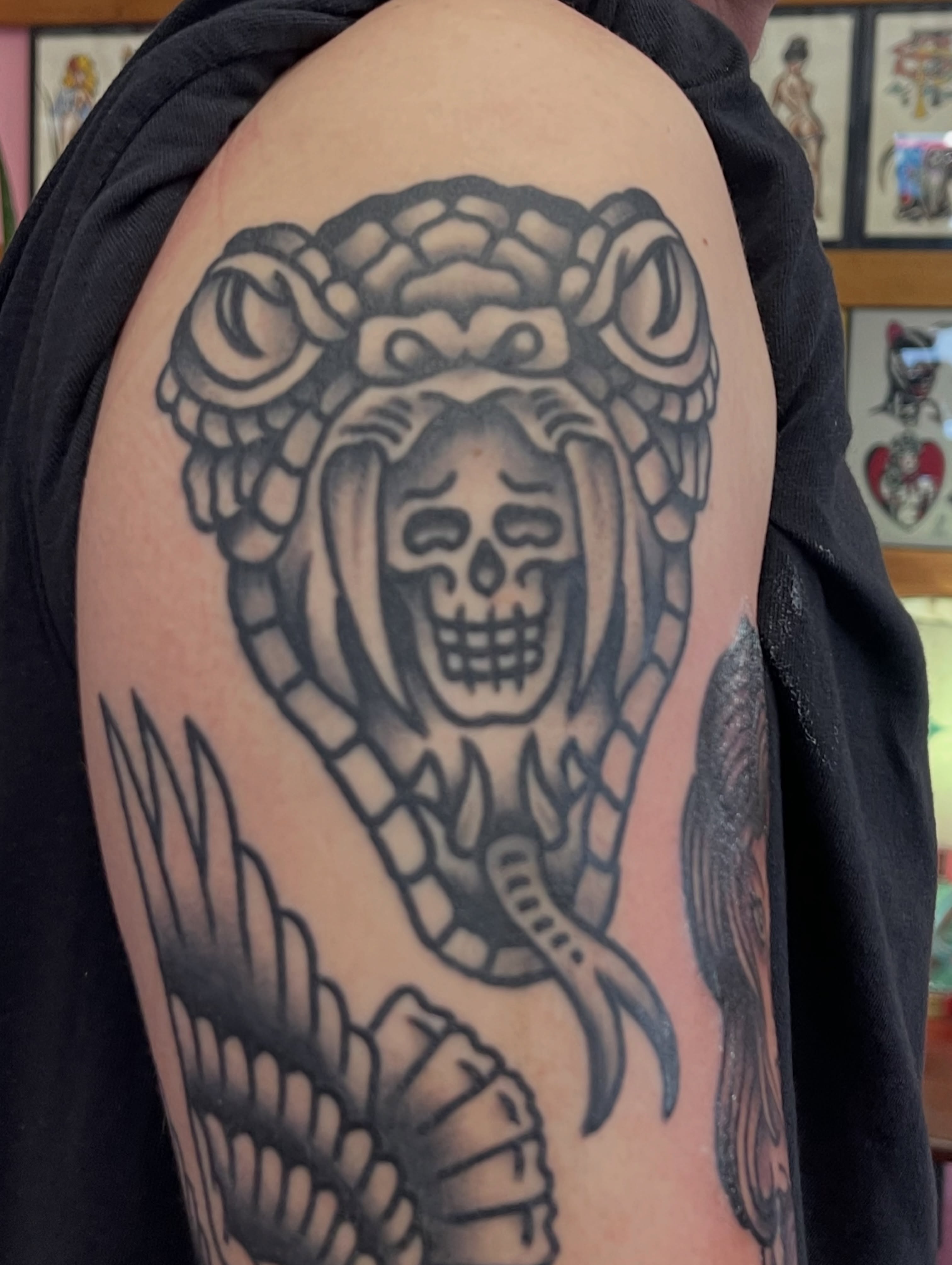 Medusa black and grey tattoo on the shoulder by Chris Martin