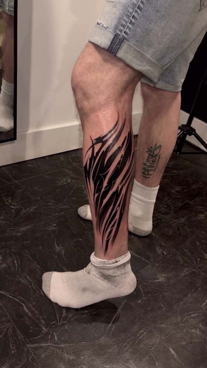 Abstract blackwork leg tattoo blackwork tattoo on the leg by Turk