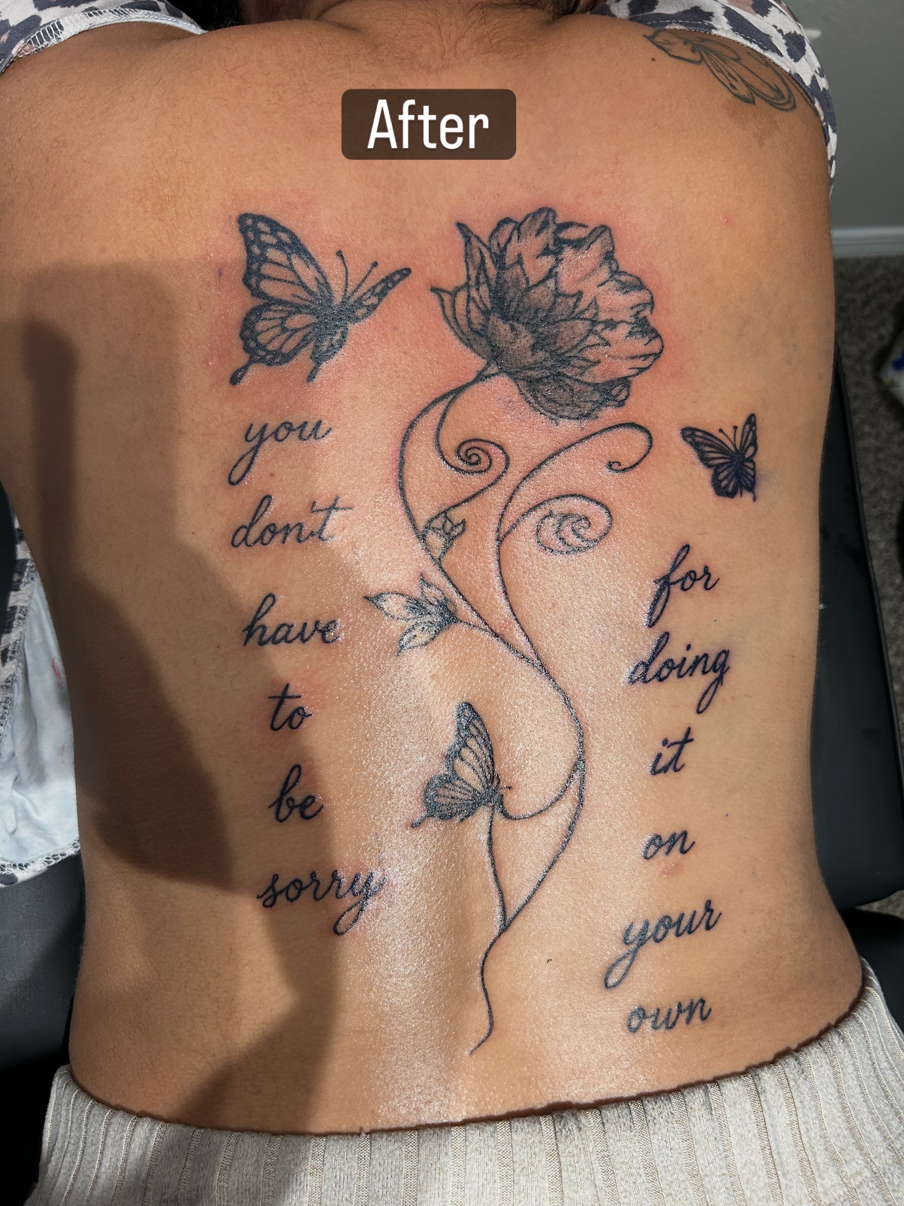 Flower and butterflies black and grey tattoo on the back by @tatzbythadon