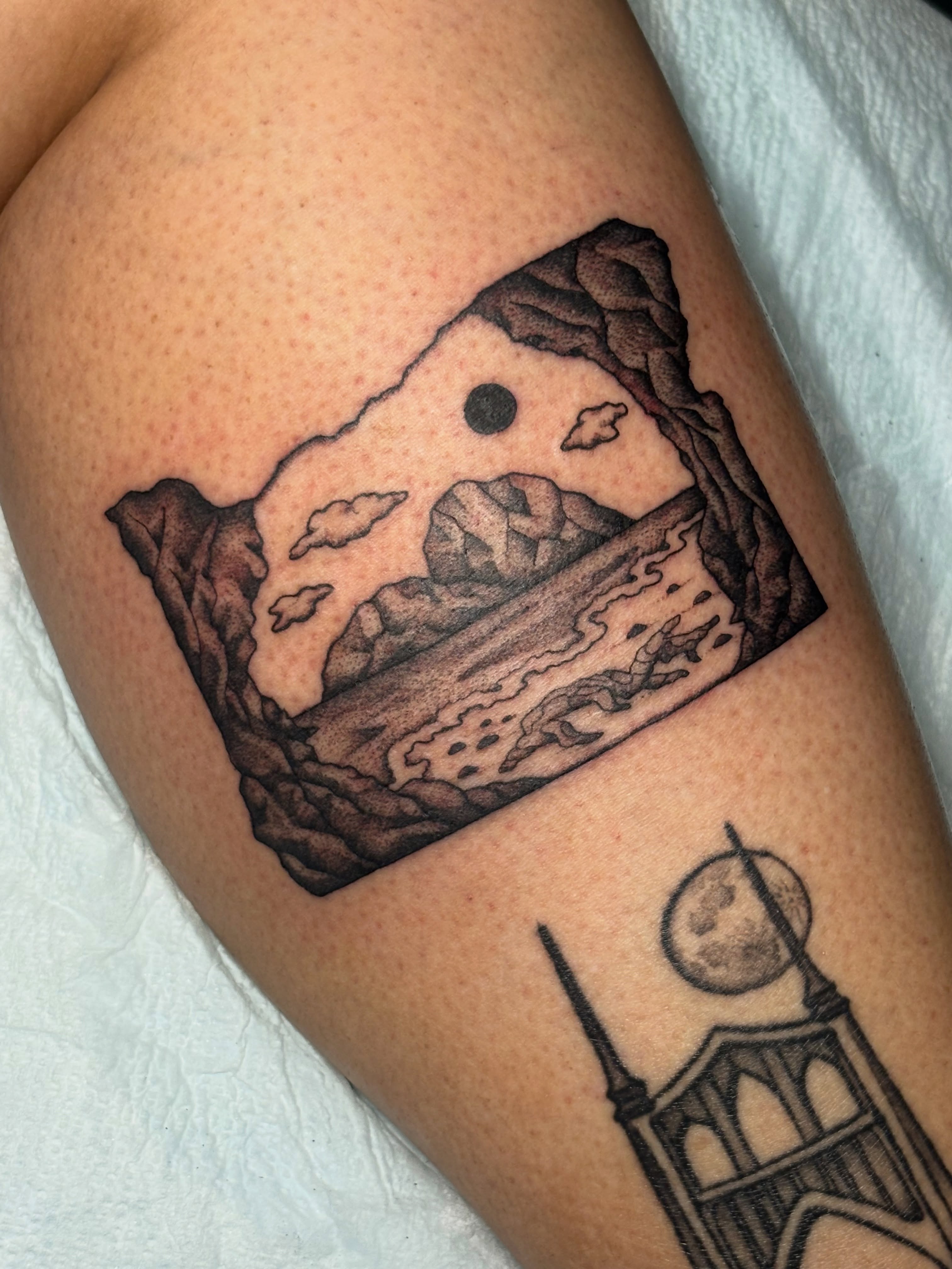 Landscape black and grey tattoo on the upper arm by ✨madison✨, Portland, Oregon