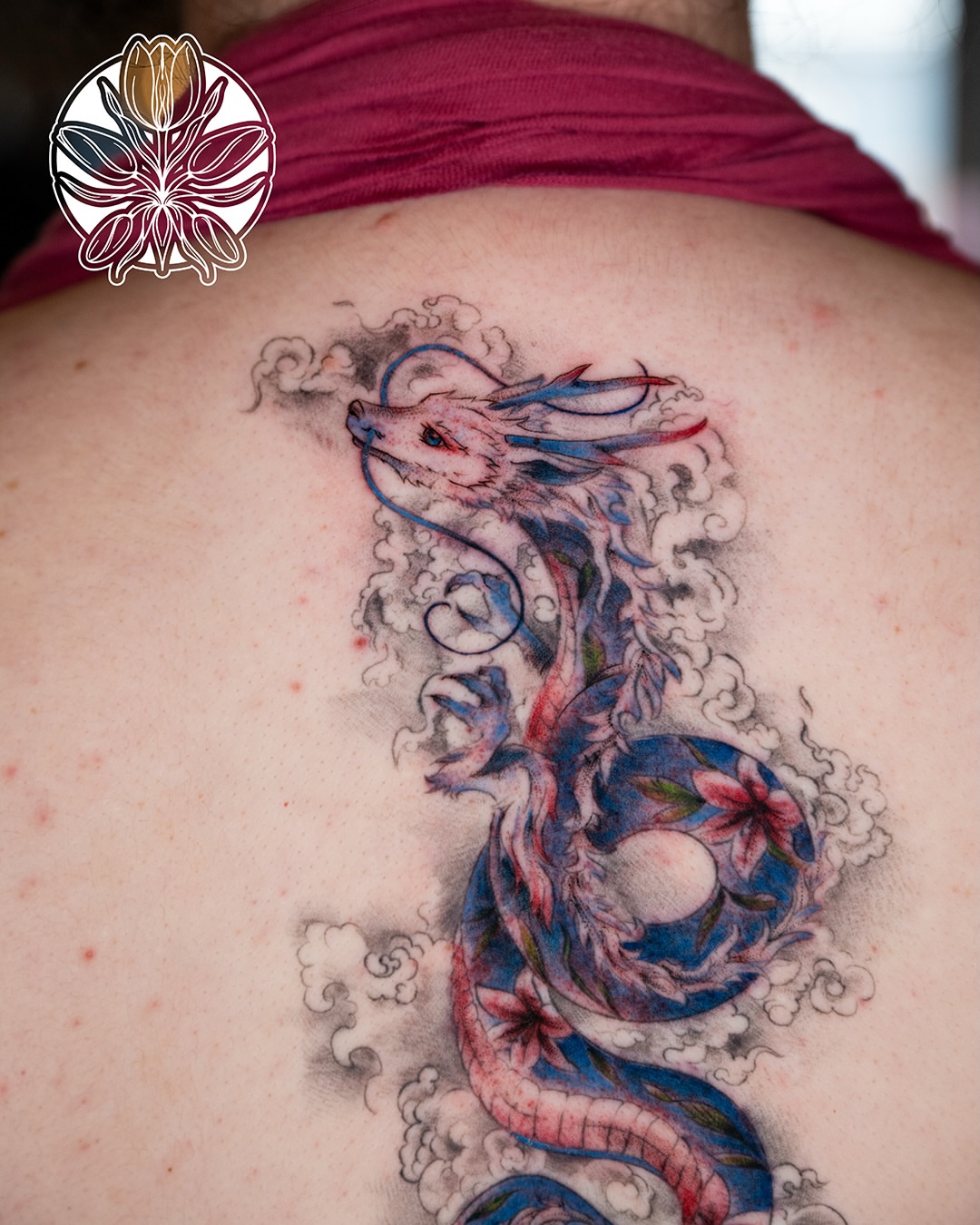Dragon new school tattoo on the back by Ori Merchan Tattoo, Kansas City, Missouri