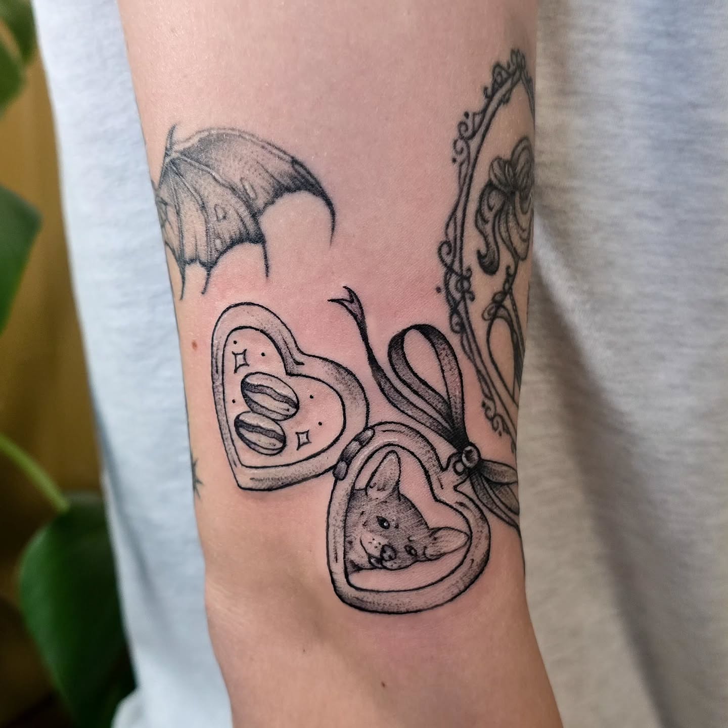 Bat, heart, cat dotwork tattoo on the forearm by Hope 🌙, Cincinnati