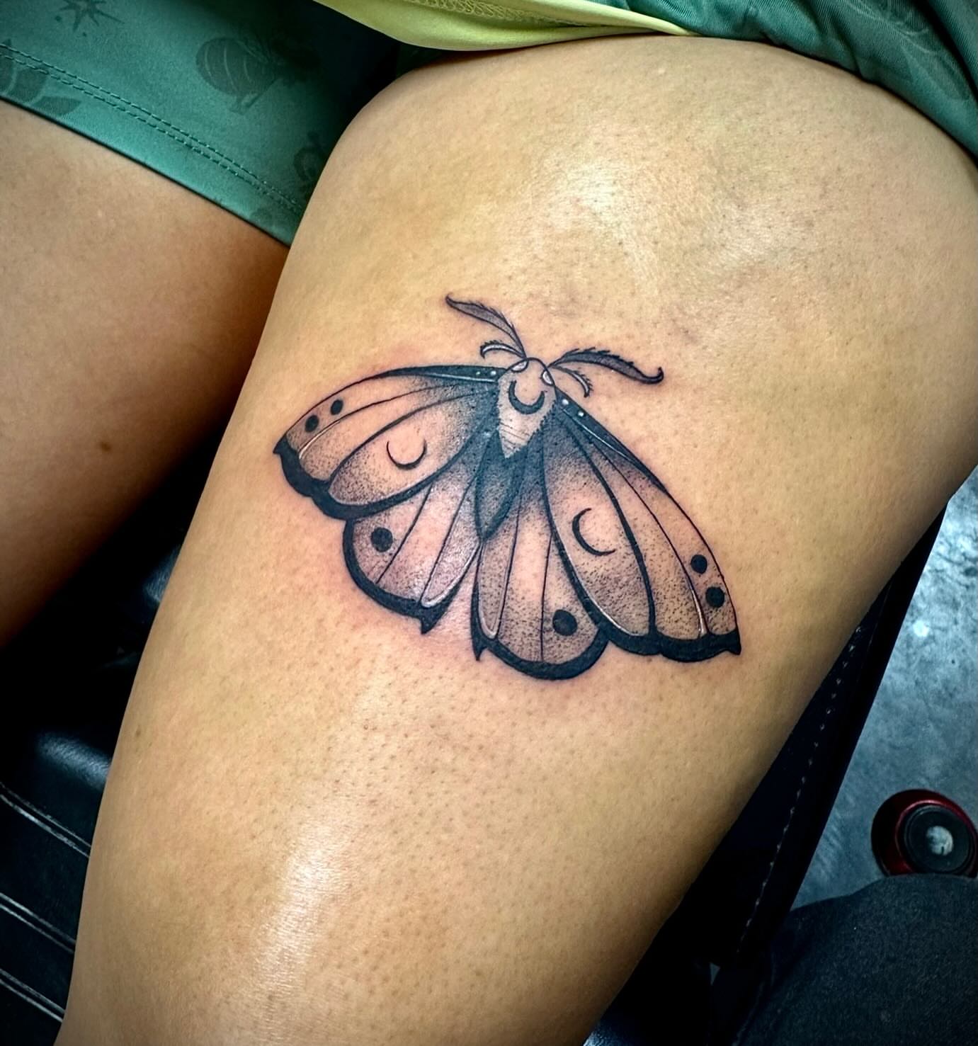 Moth dotwork tattoo on the thigh by Kyle Haitch, Las Vegas, Nevada