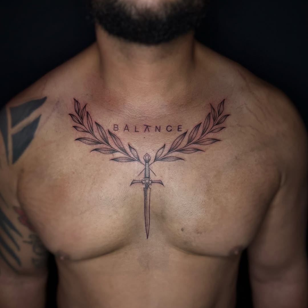 Sword and laurel wreath black and grey tattoo on the chest by ๐๐ญ๐ฆ๐จ๐ณ๐ข โ๐๐ฆ๐จโ ๐ฆต