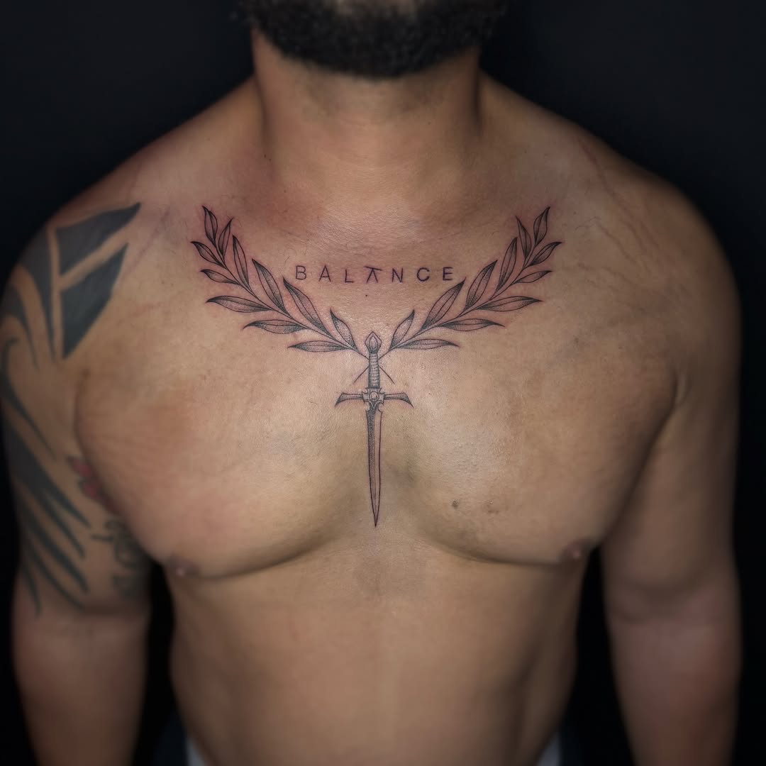 Sword and laurel wreath black and grey tattoo on the chest by ๐๐ญ๐ฆ๐จ๐ณ๐ข โ๐๐ฆ๐จโ ๐ฆต