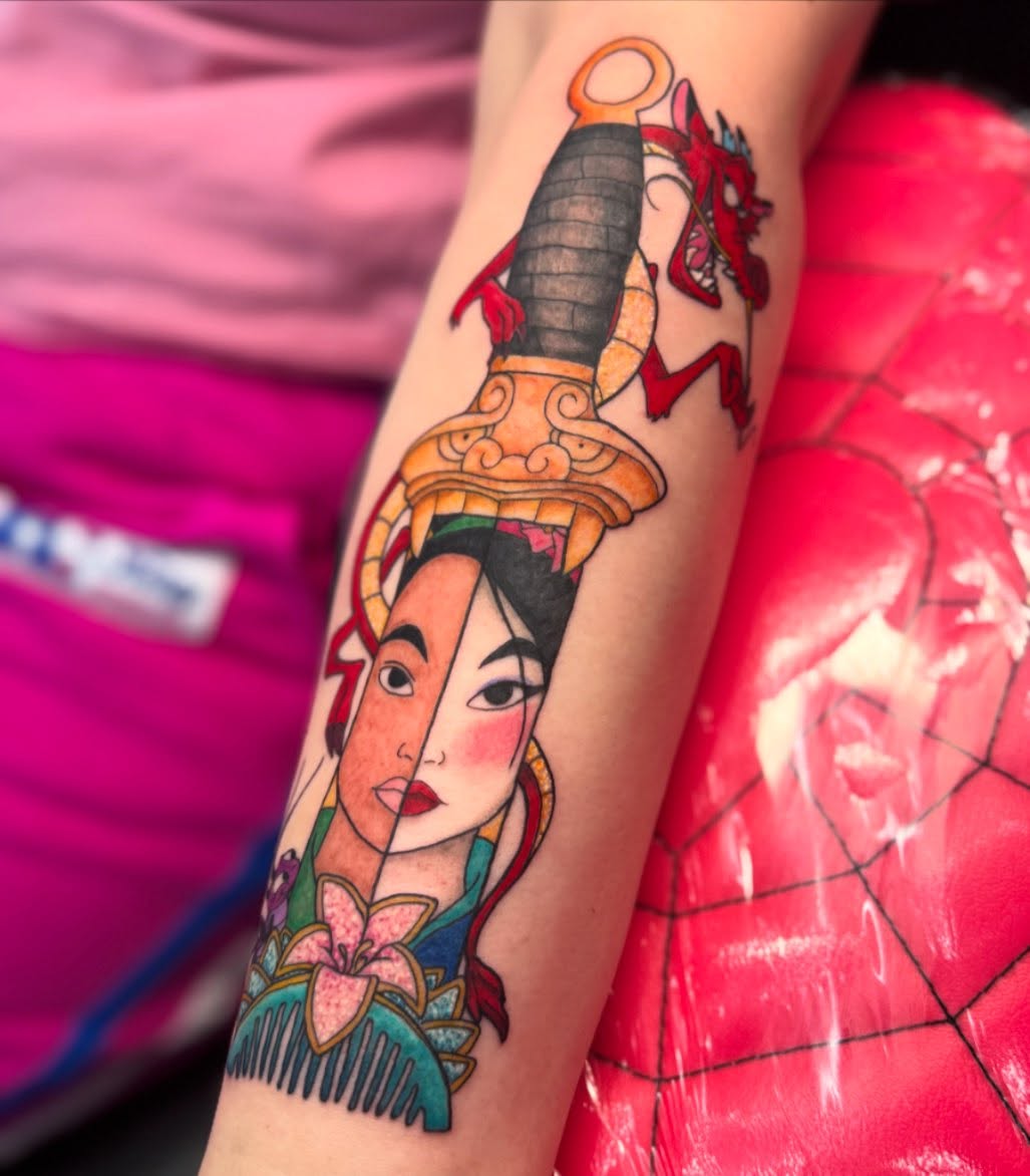 Mulan and sword American traditional tattoo on the forearm by Jada Reynolds
