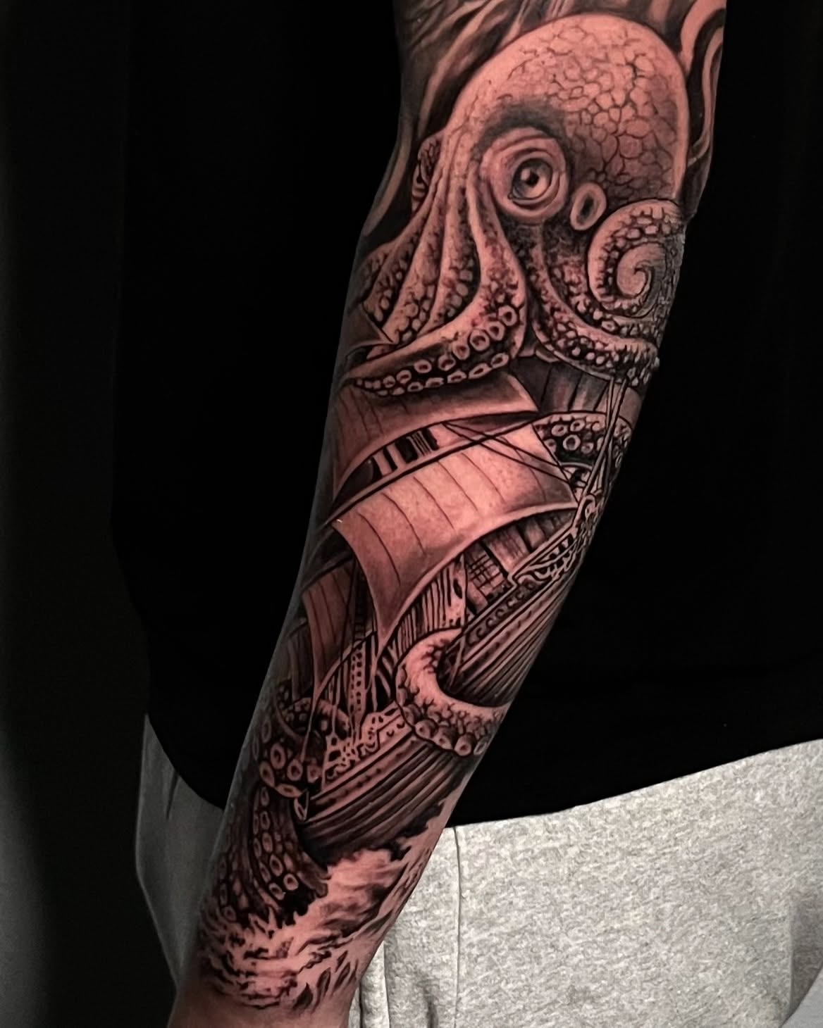 Octopus and ship realism tattoo on the forearm by Dave