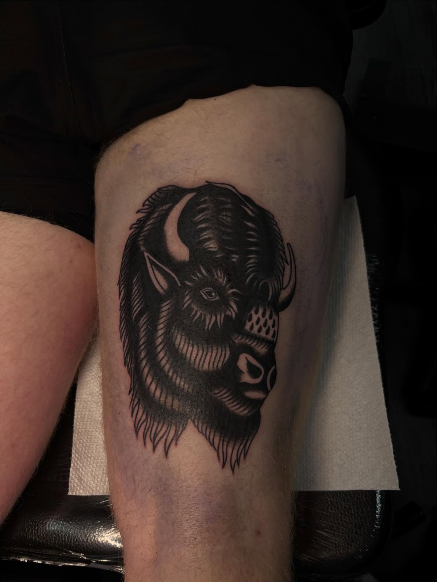 Buffalo head black and grey tattoo on the forearm by Ethan Ellis, Dallas, Texas