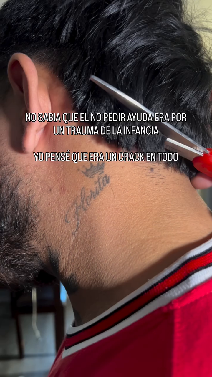 Neck tattoo with script tattoo on the upper arm by Jonny Vicious